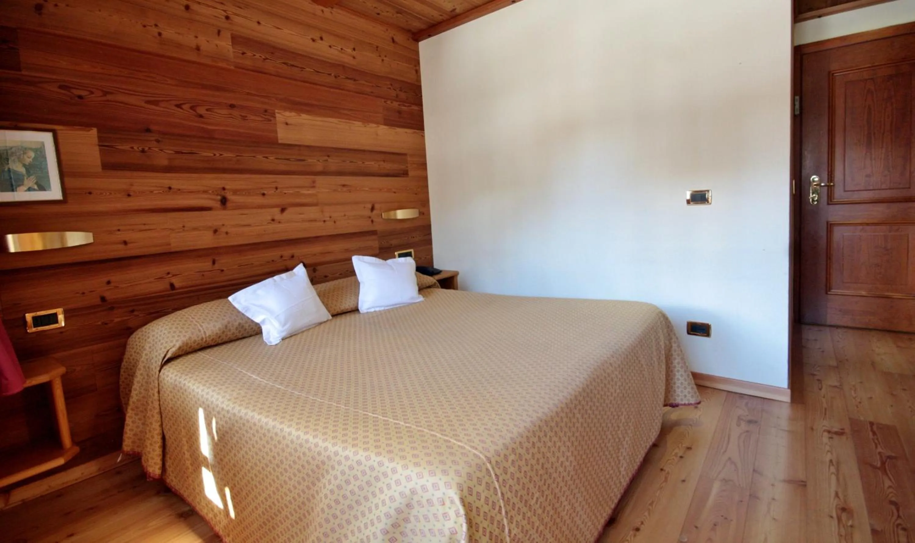 Bed in Hotel La Meridiana