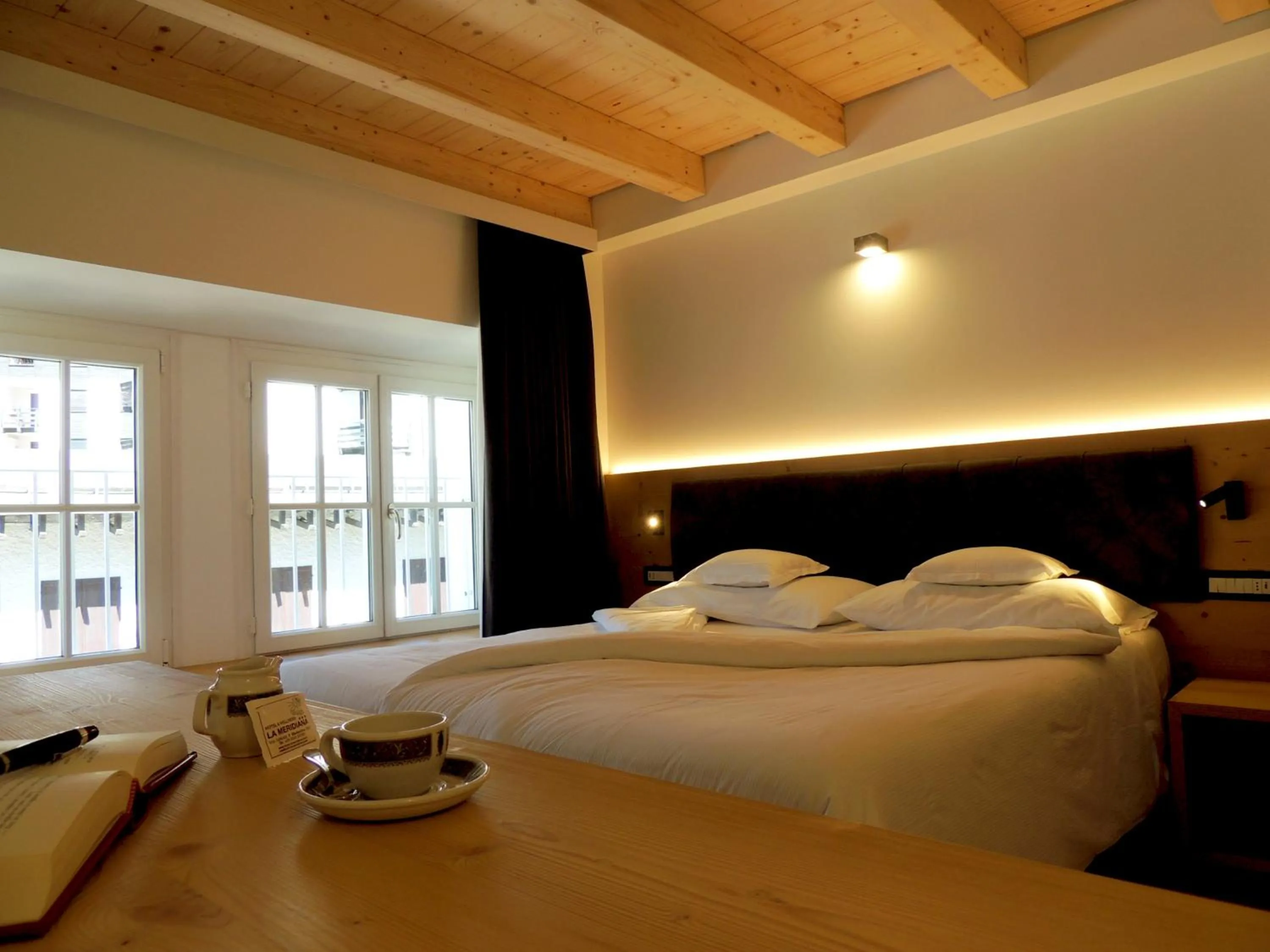 Bed in Hotel La Meridiana