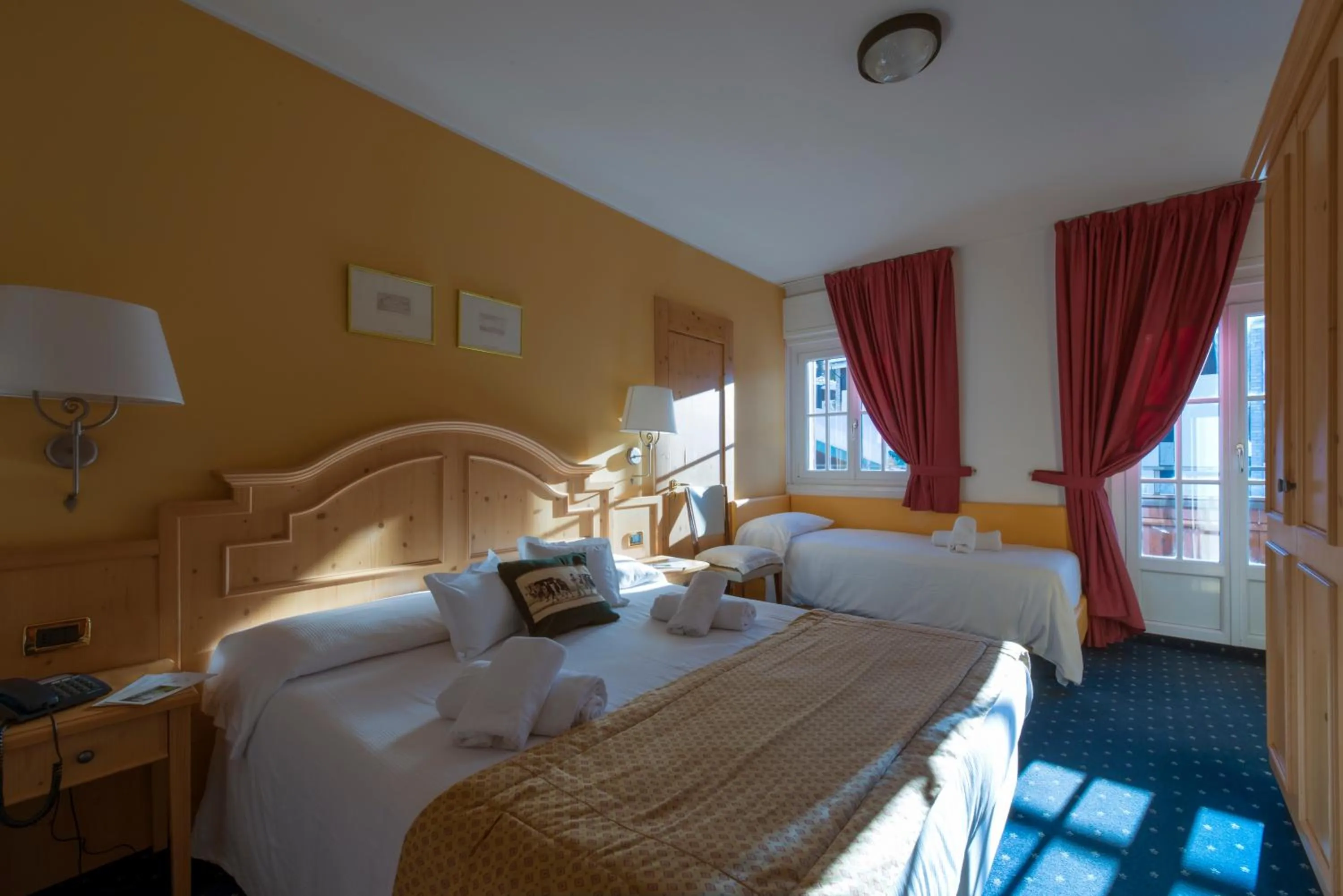 Bed in Hotel La Meridiana