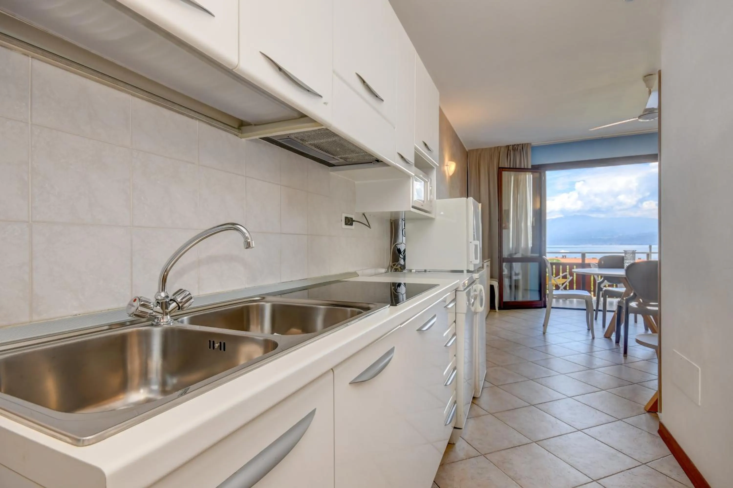 Kitchen or kitchenette in Apparthotel San Sivino