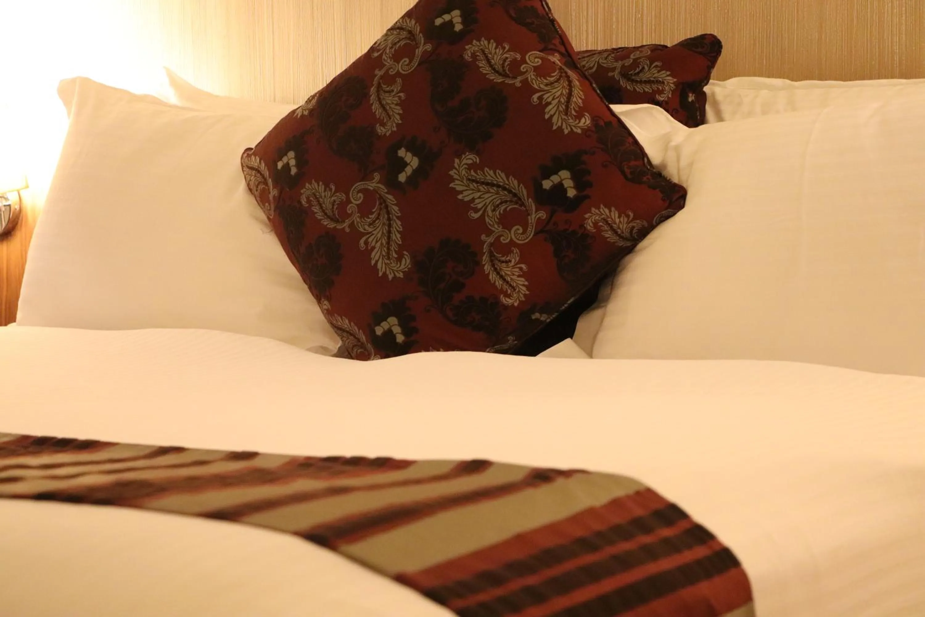 Bed in Mamba Point Hotel