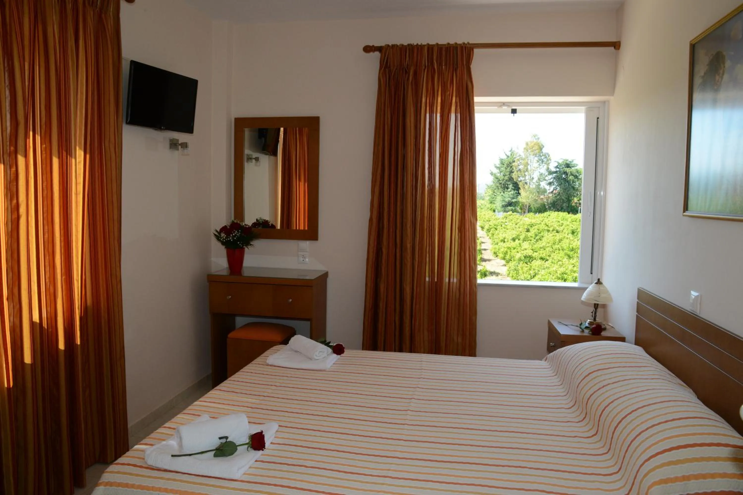 Bed in Maria's Filoxenia Suites