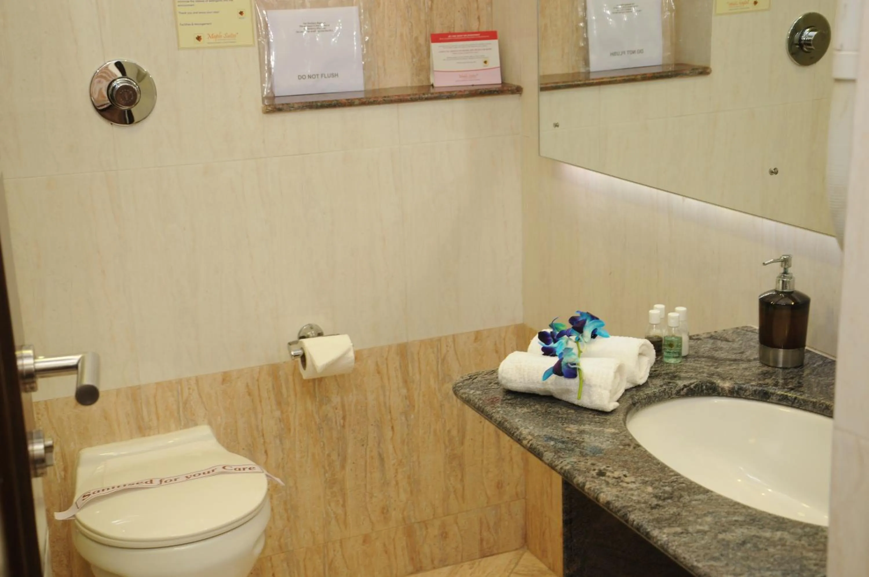 Bathroom in Maple Suites