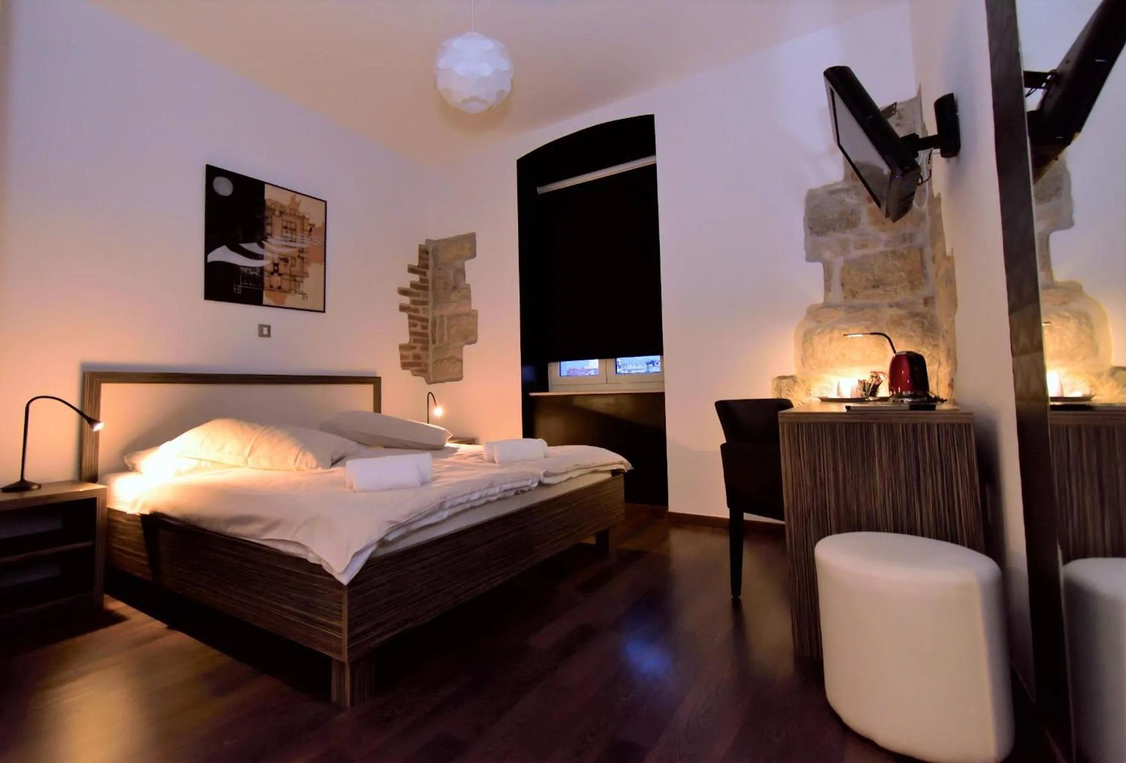 Bed in Marmontova Luxury Rooms