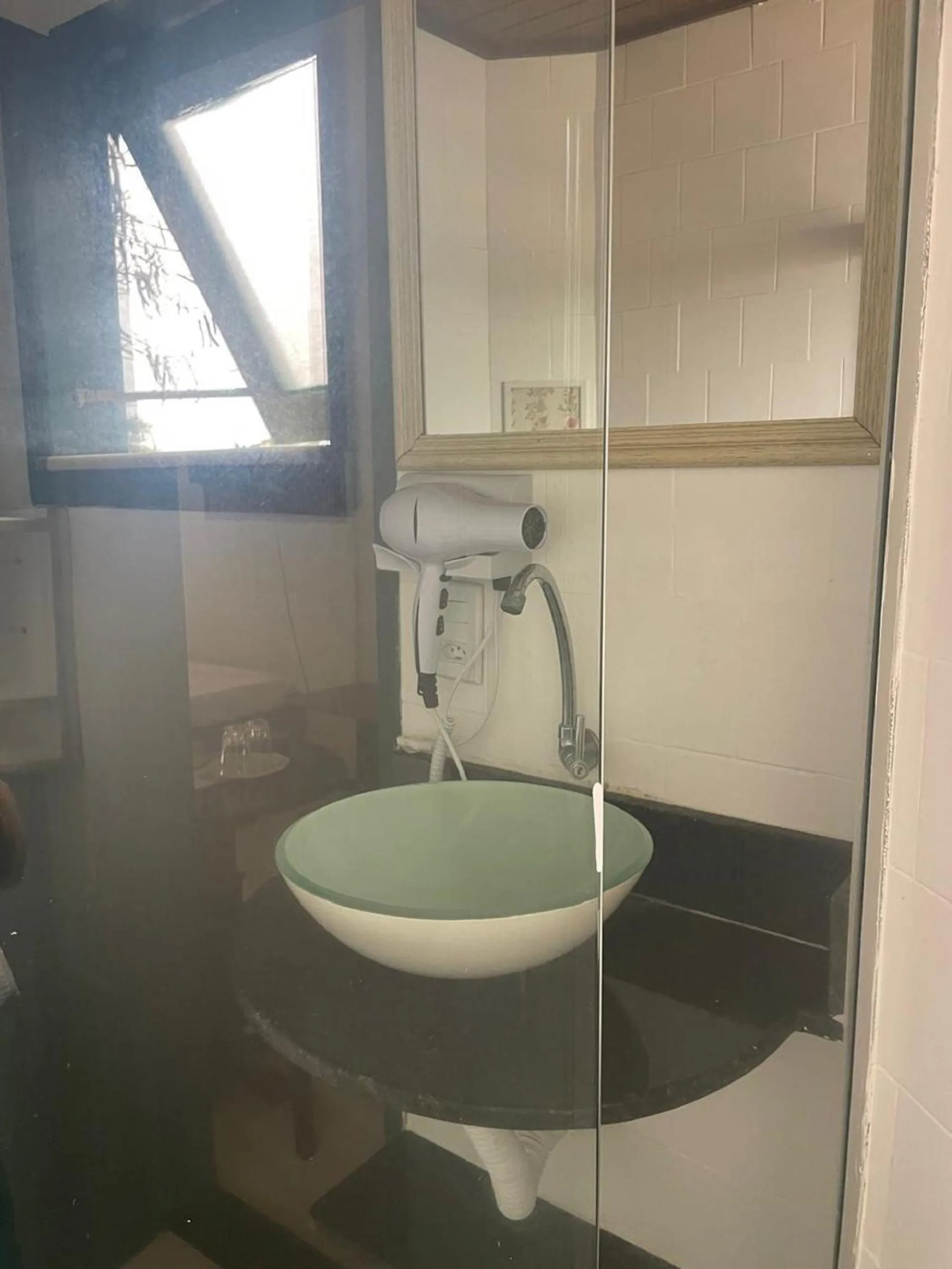 Bathroom in Pousada Saint Germain