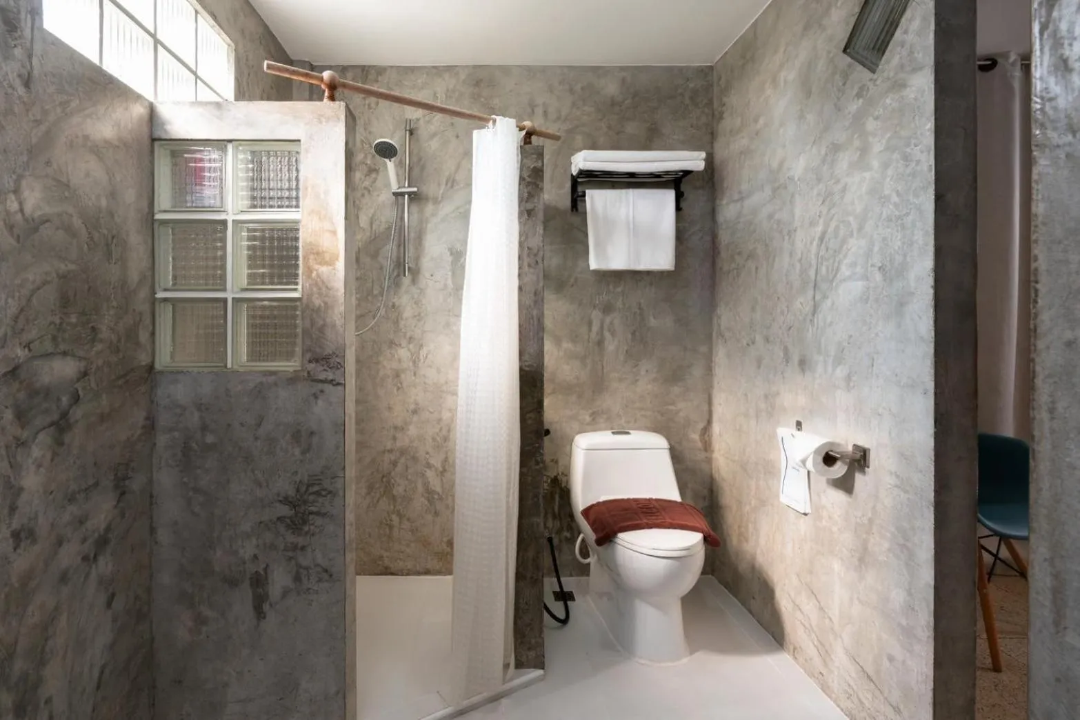 Toilet in Dolphin Bay Beach Resort