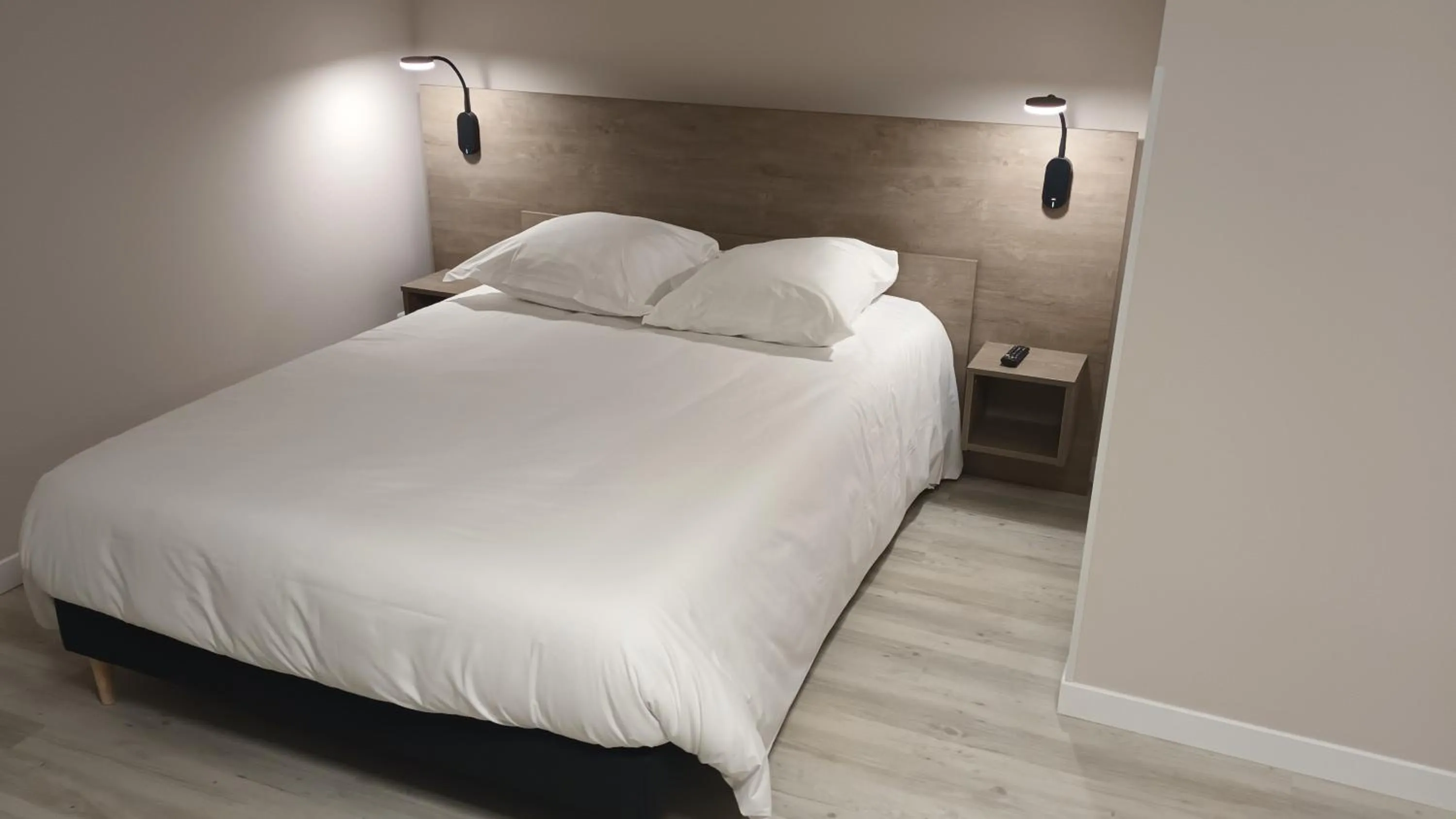 Bedroom, Bed in Le Petit Logis