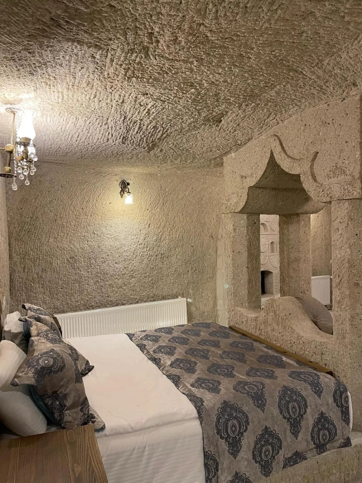 Bed in Cappadocia Empire Cave Hotel