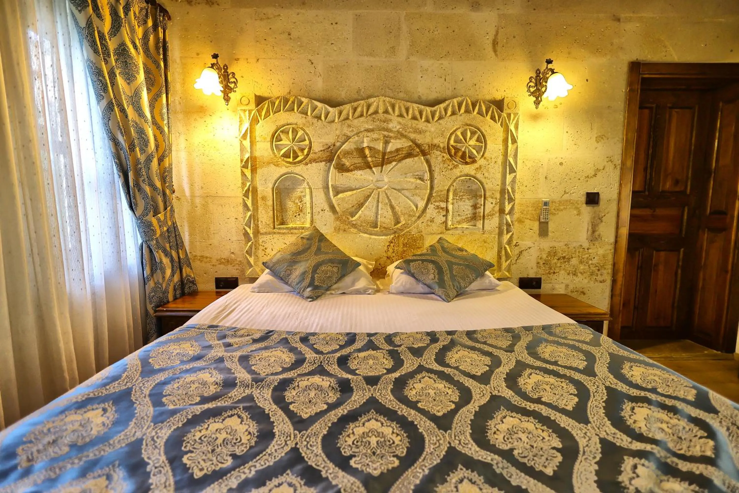 Bed in Cappadocia Empire Cave Hotel