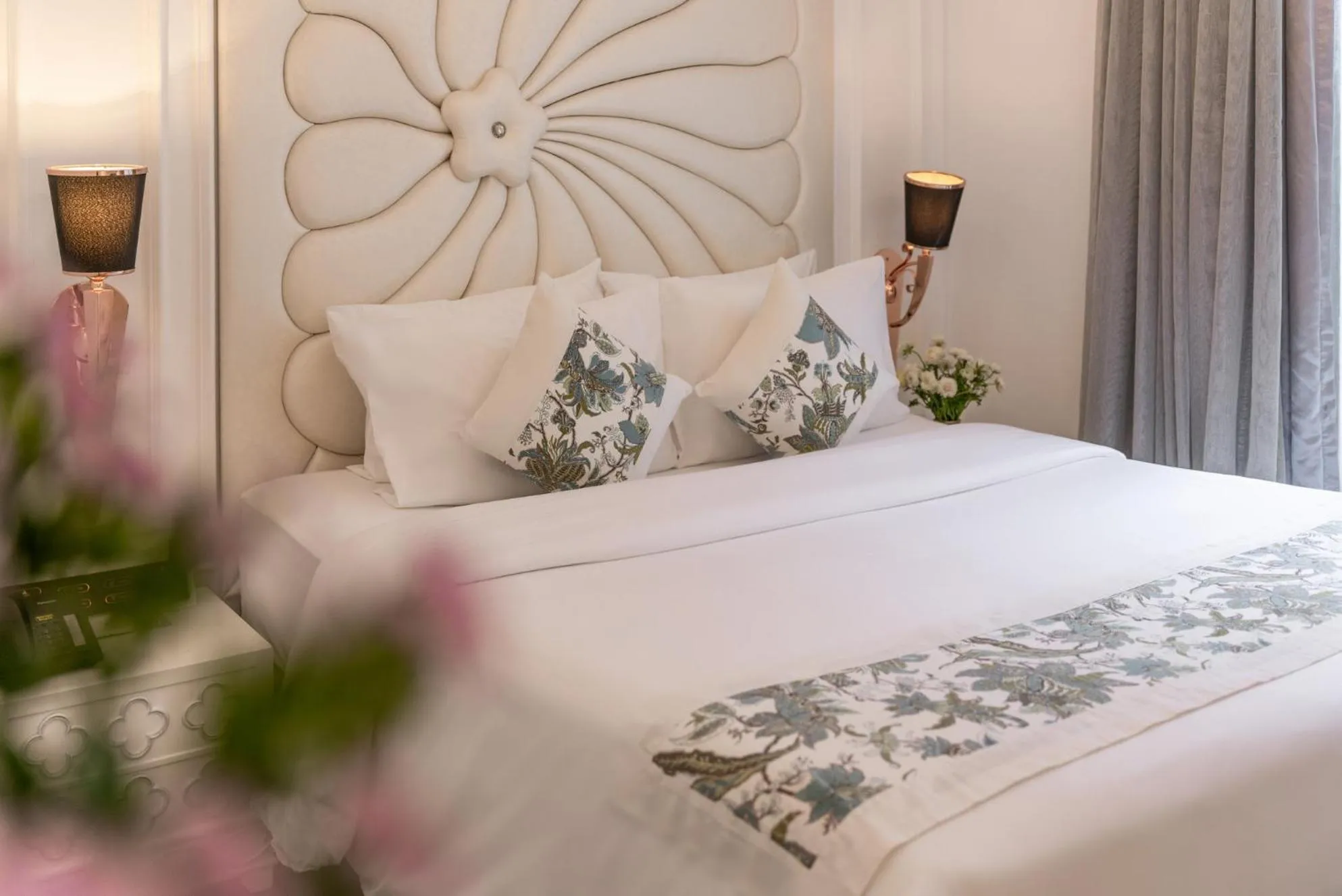 Bed in A&EM Saigon Hotel