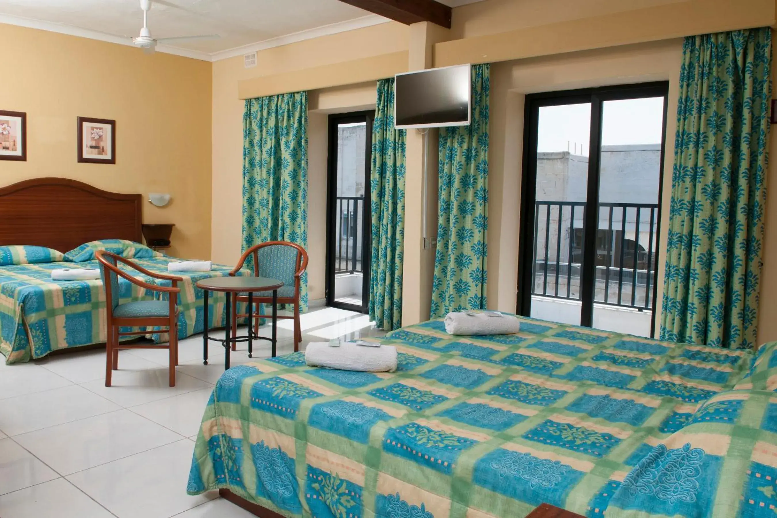 Quadruple Room with Balcony and Airport Shuttle included in EUROCLUB Hotel Quadruple Room with Balcony and Airport Shuttle included in EUROCLUB Hotel