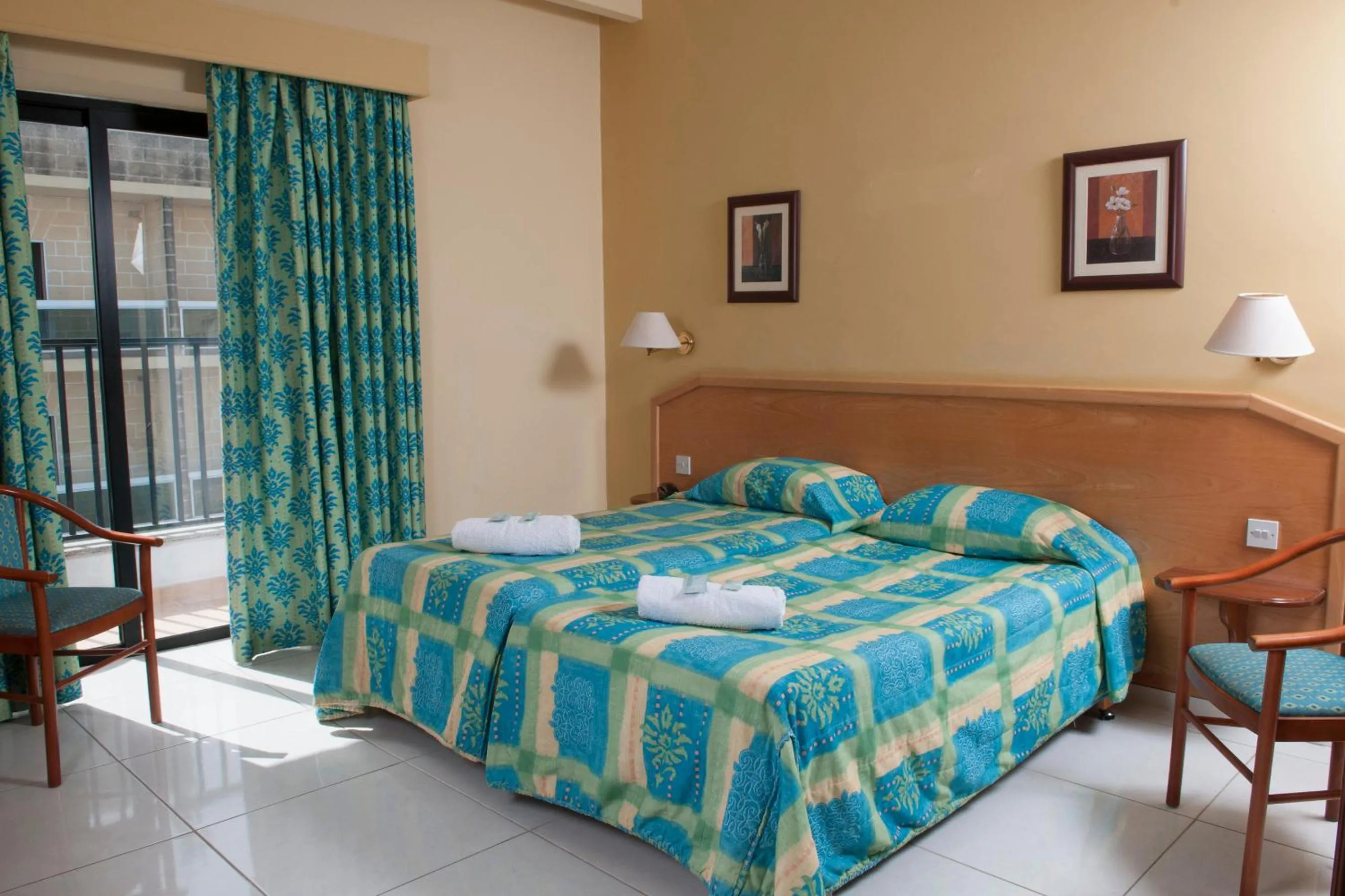 Bed in EUROCLUB Hotel