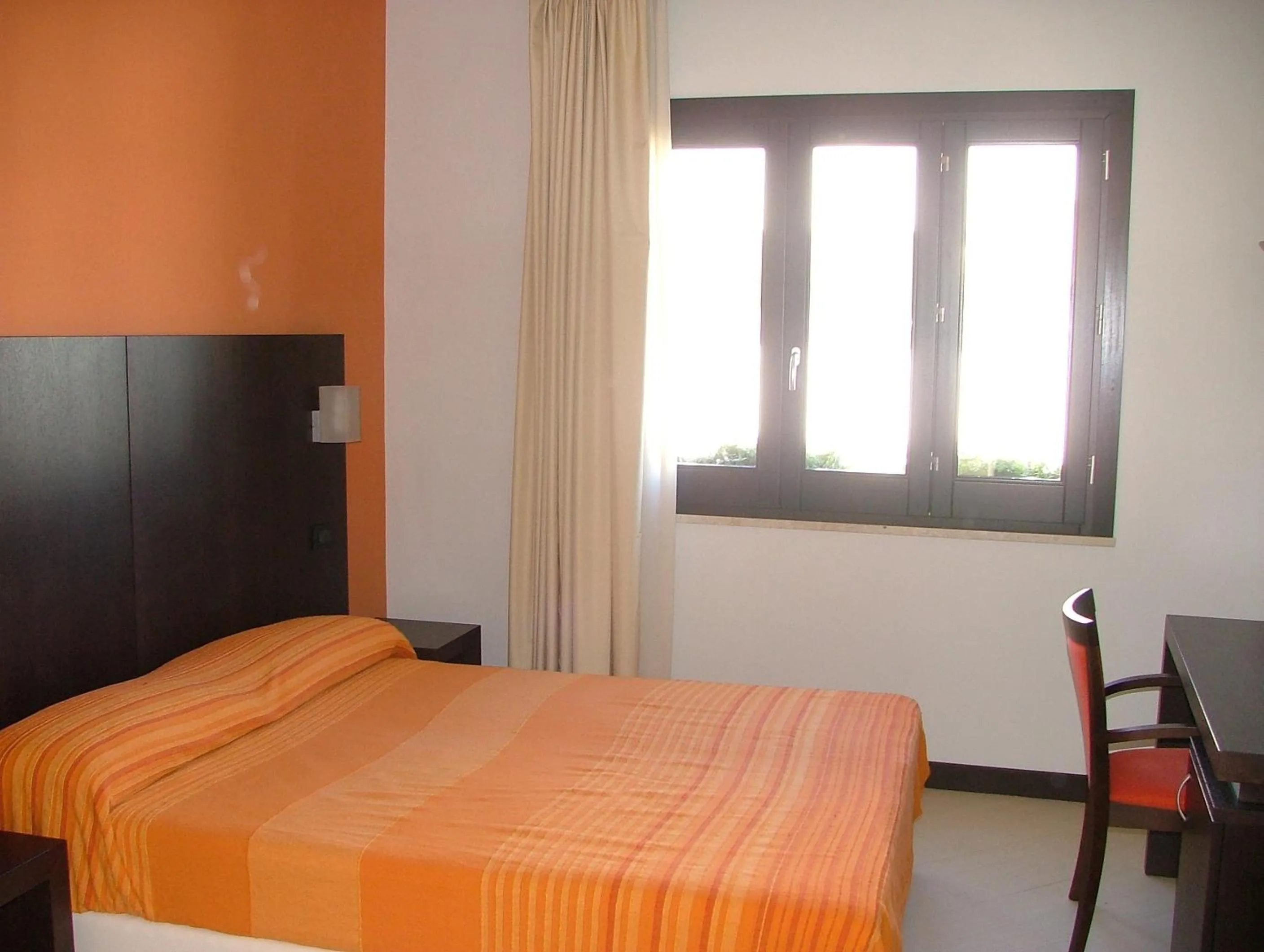 Bedroom in Villa Faro B&B