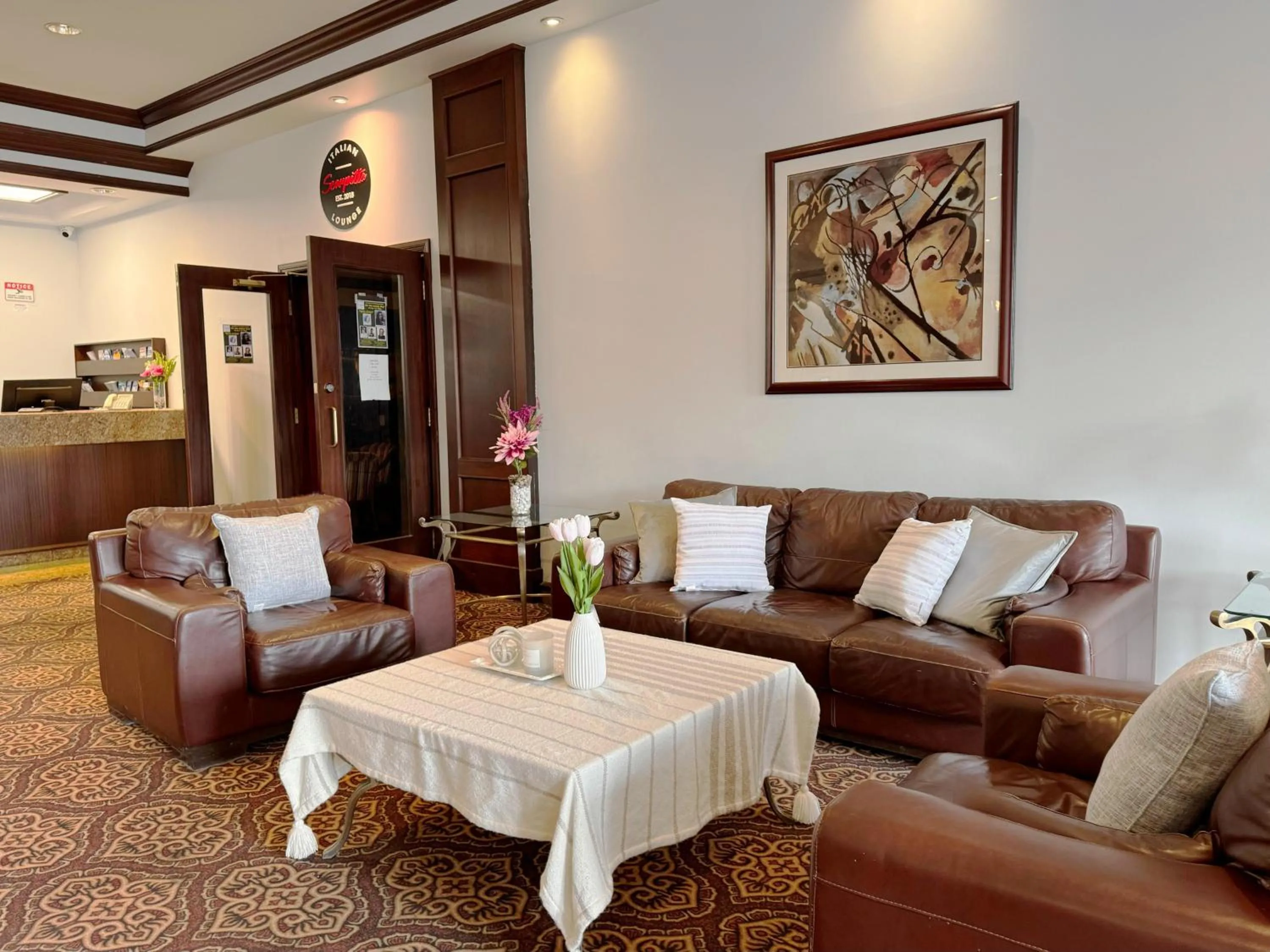 Seating area in Divya Sutra Plaza and Conference Centre Calgary Airport