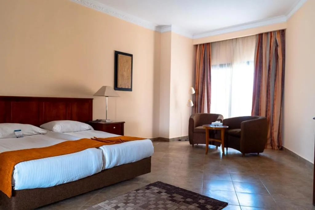 Bedroom, Bed in Swiss Inn Plaza Hotel