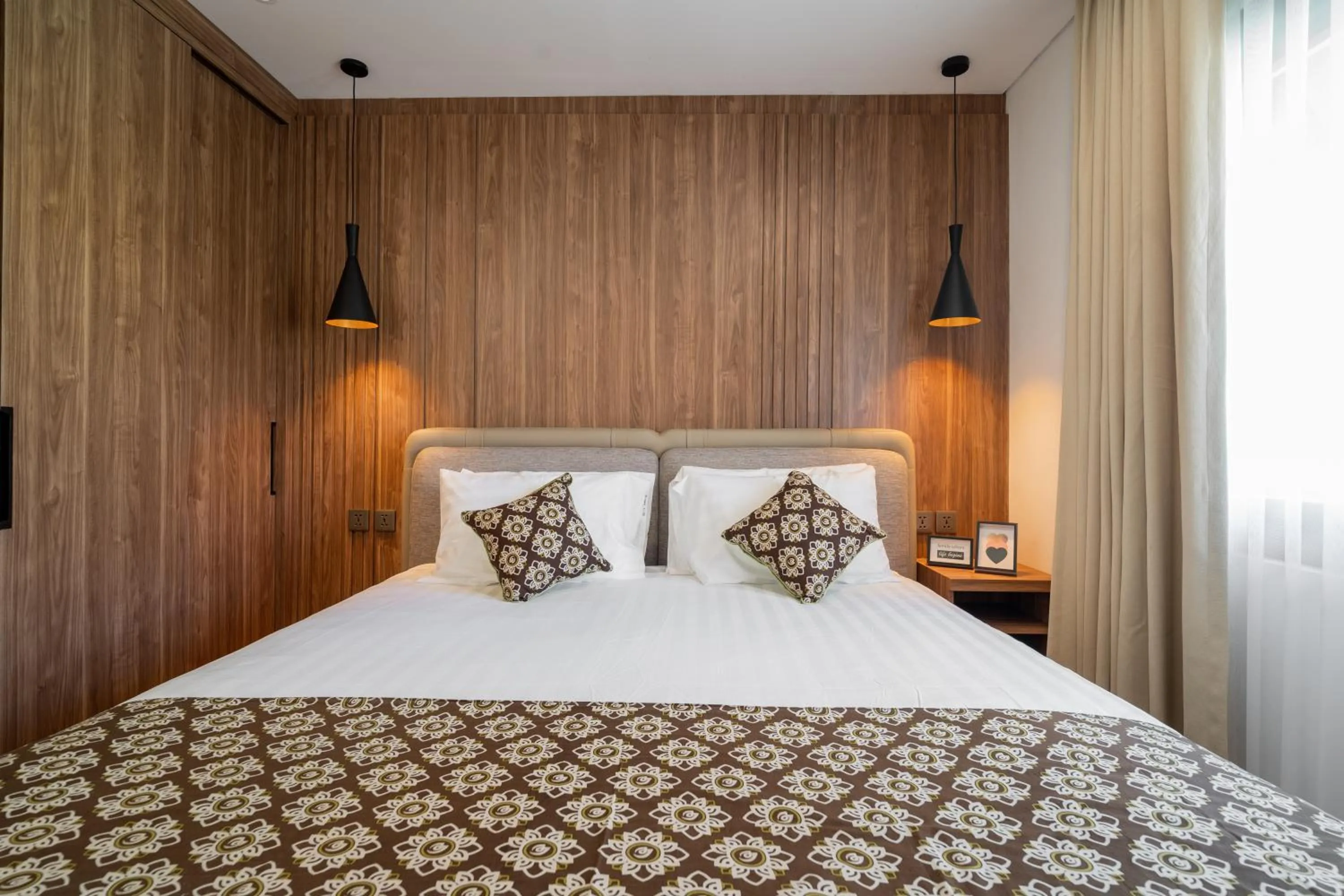 Bed in Plagoo Holiday Hotel