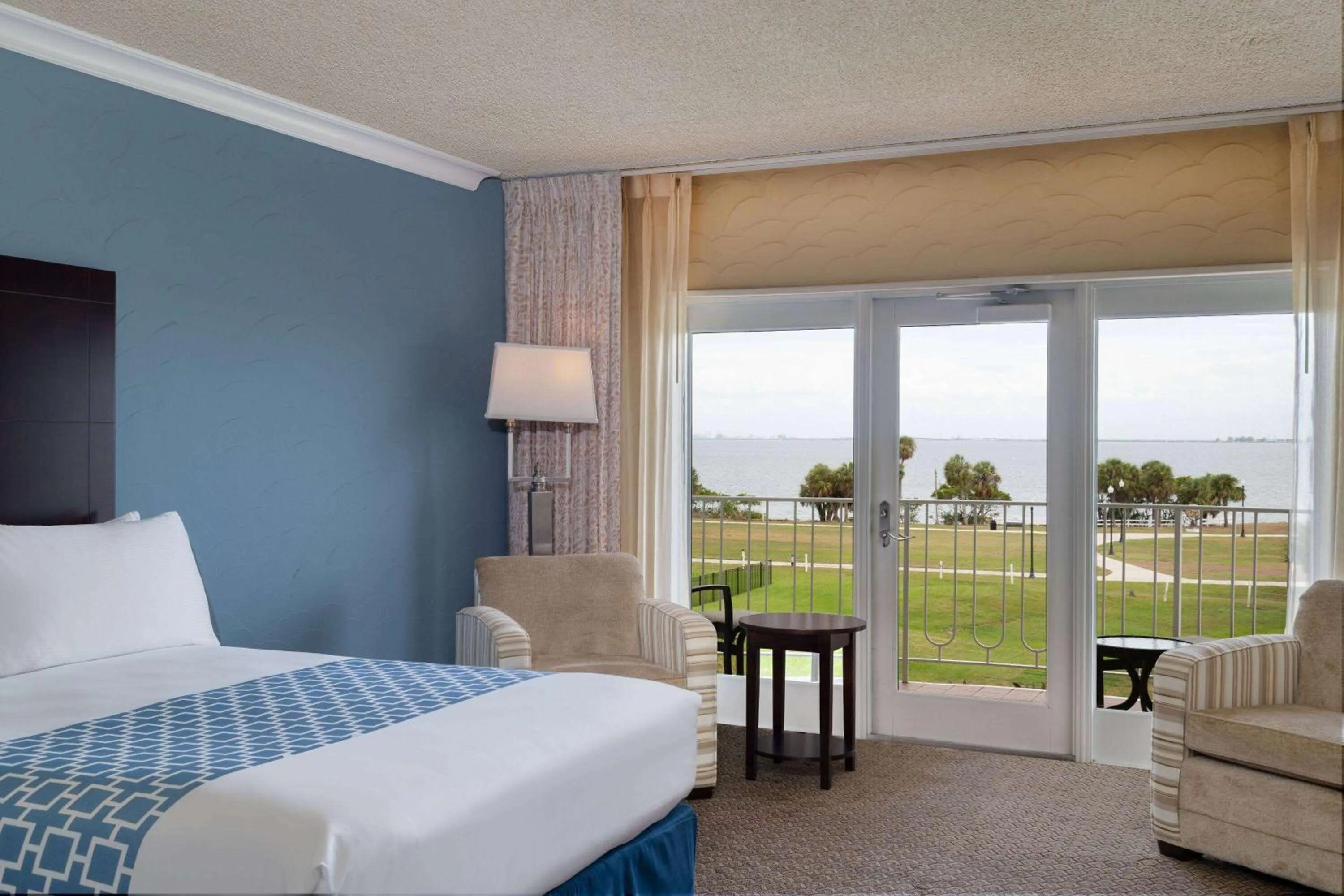 Bed in Safety Harbor Resort & Spa Trademark Collection by Wyndham
