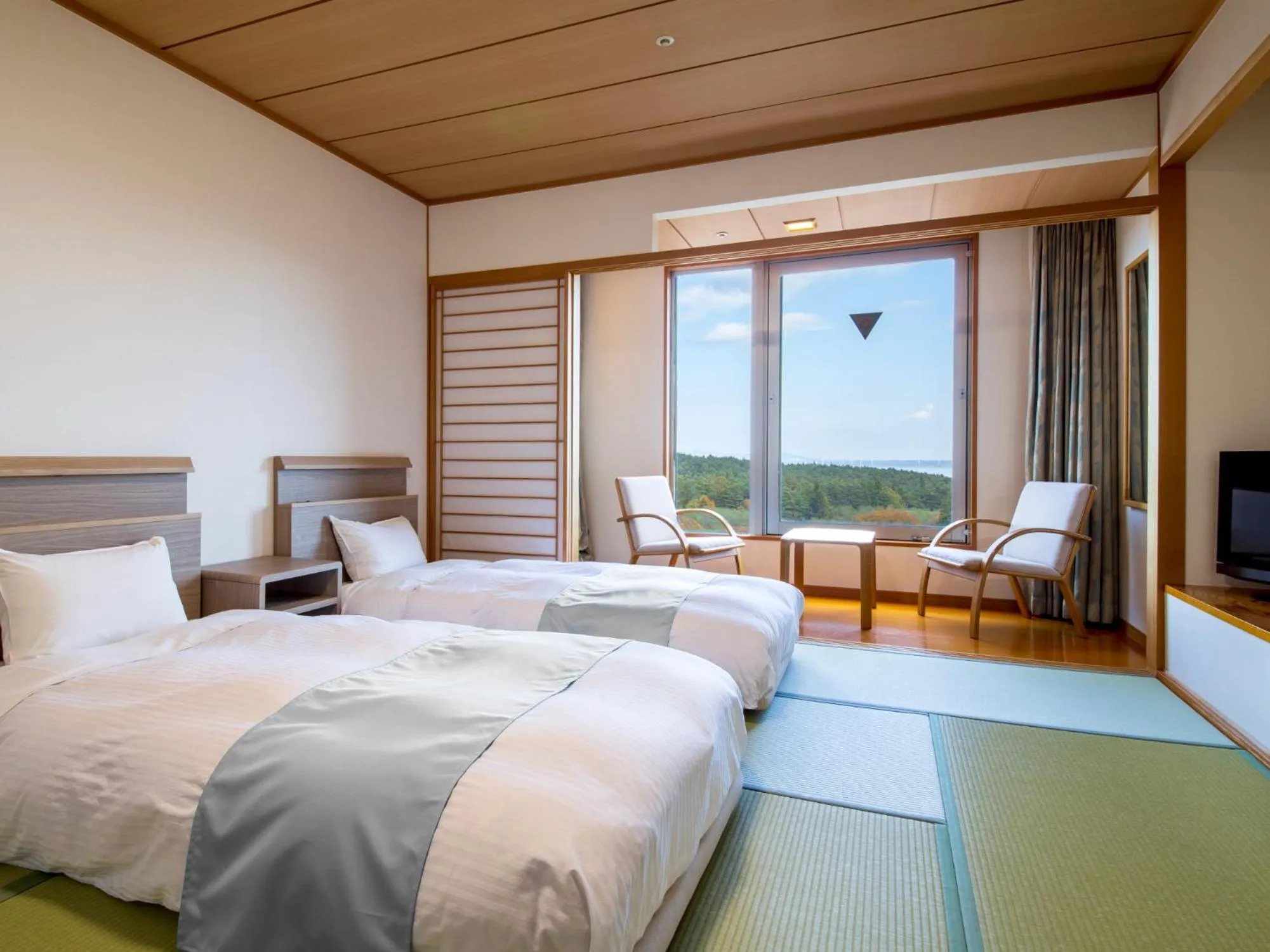 Bed in KAMENOI HOTEL Aomori Makado