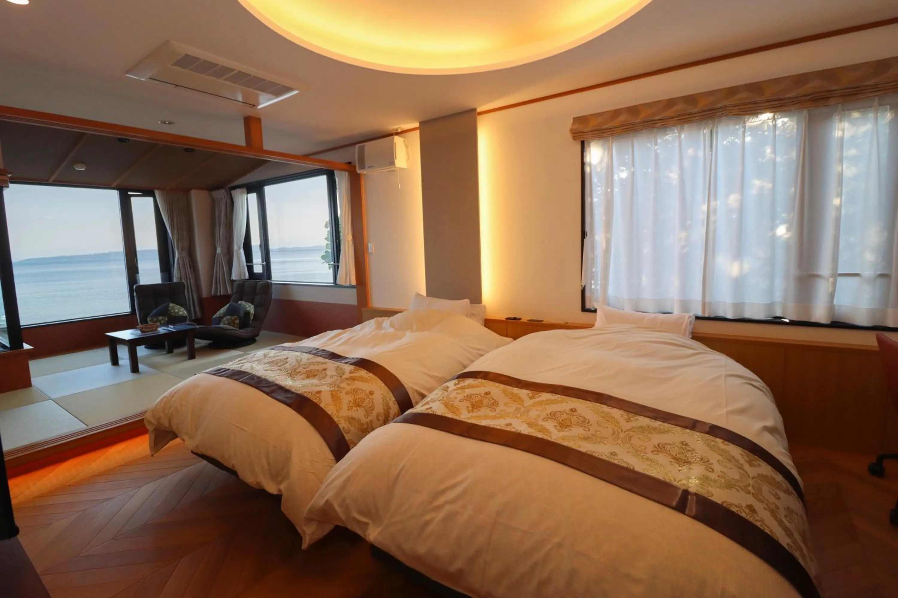 Bed in La se ri Resort and Stay