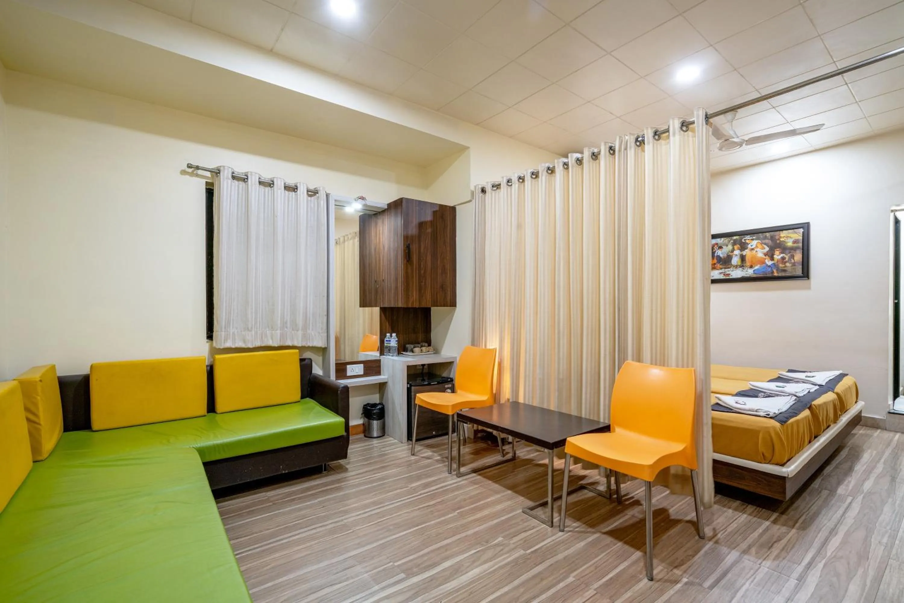 Photo of the whole room in Hotel Darshan Executive