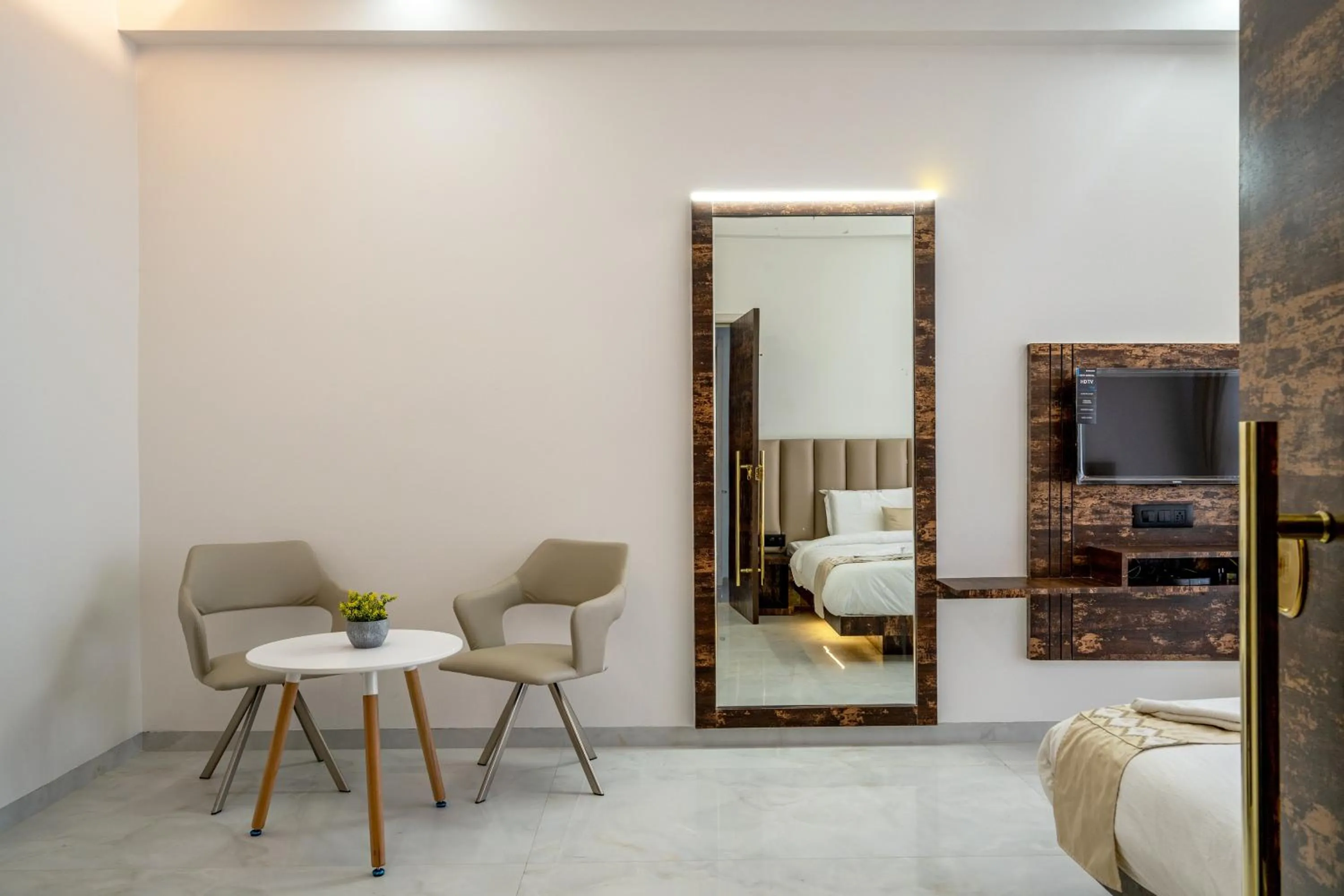 Seating area, Bed in Hotel Darshan Executive