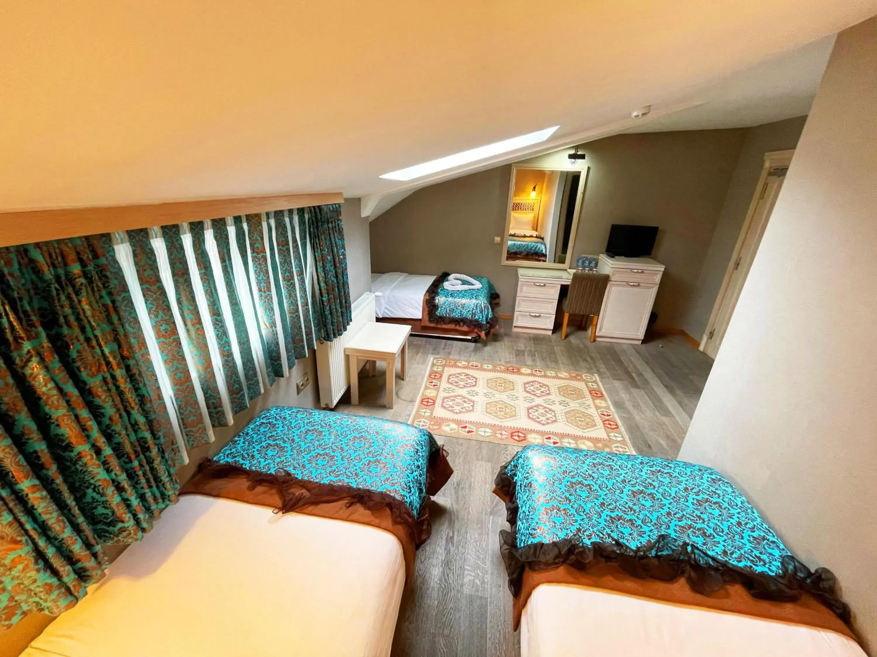 Standard Triple Room in Hotel Novano Standard Triple Room in Hotel Novano