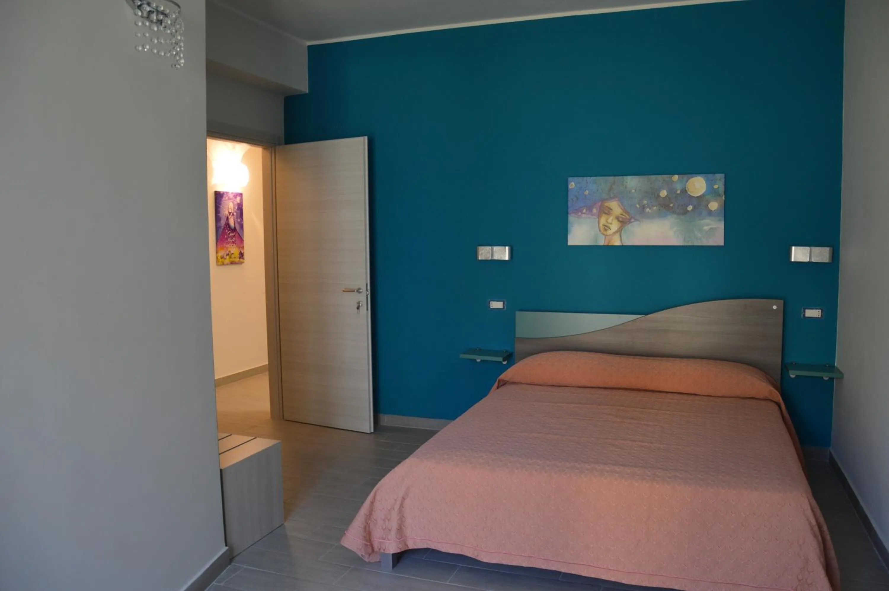 Photo of the whole room, Bed in Good Night Moon B&B