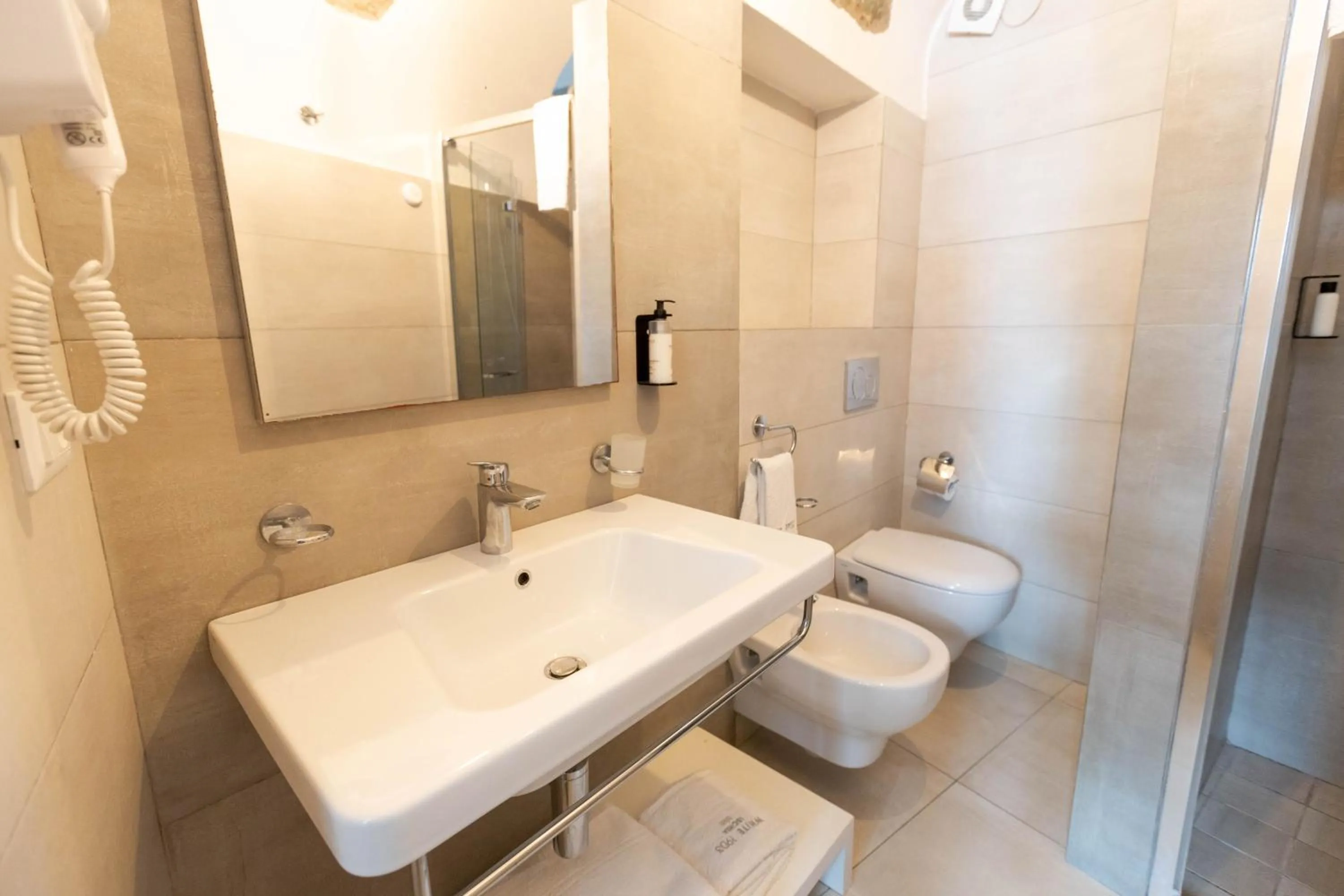 Bathroom in White 1903 - Rooftop Pool & Luxury Rooms