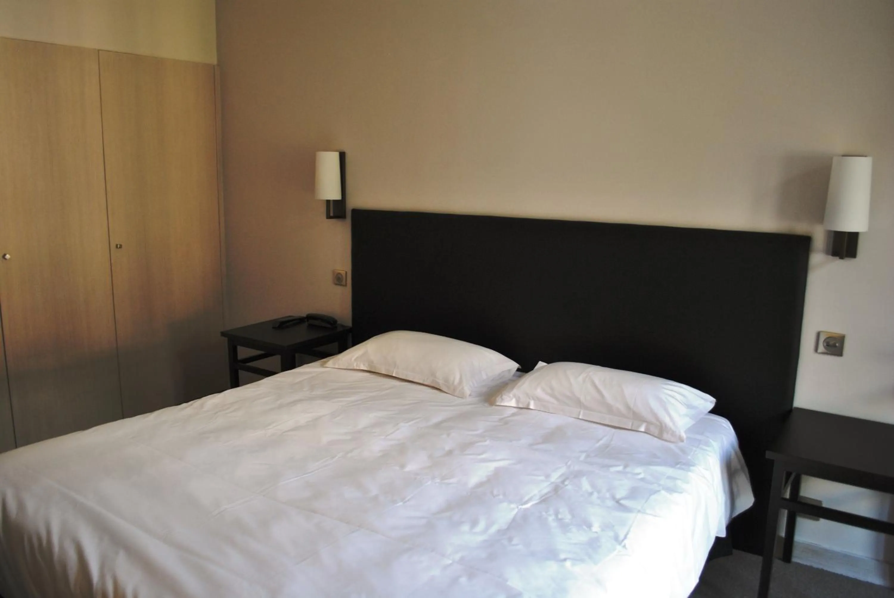 Bedroom in Hôtel Richemond