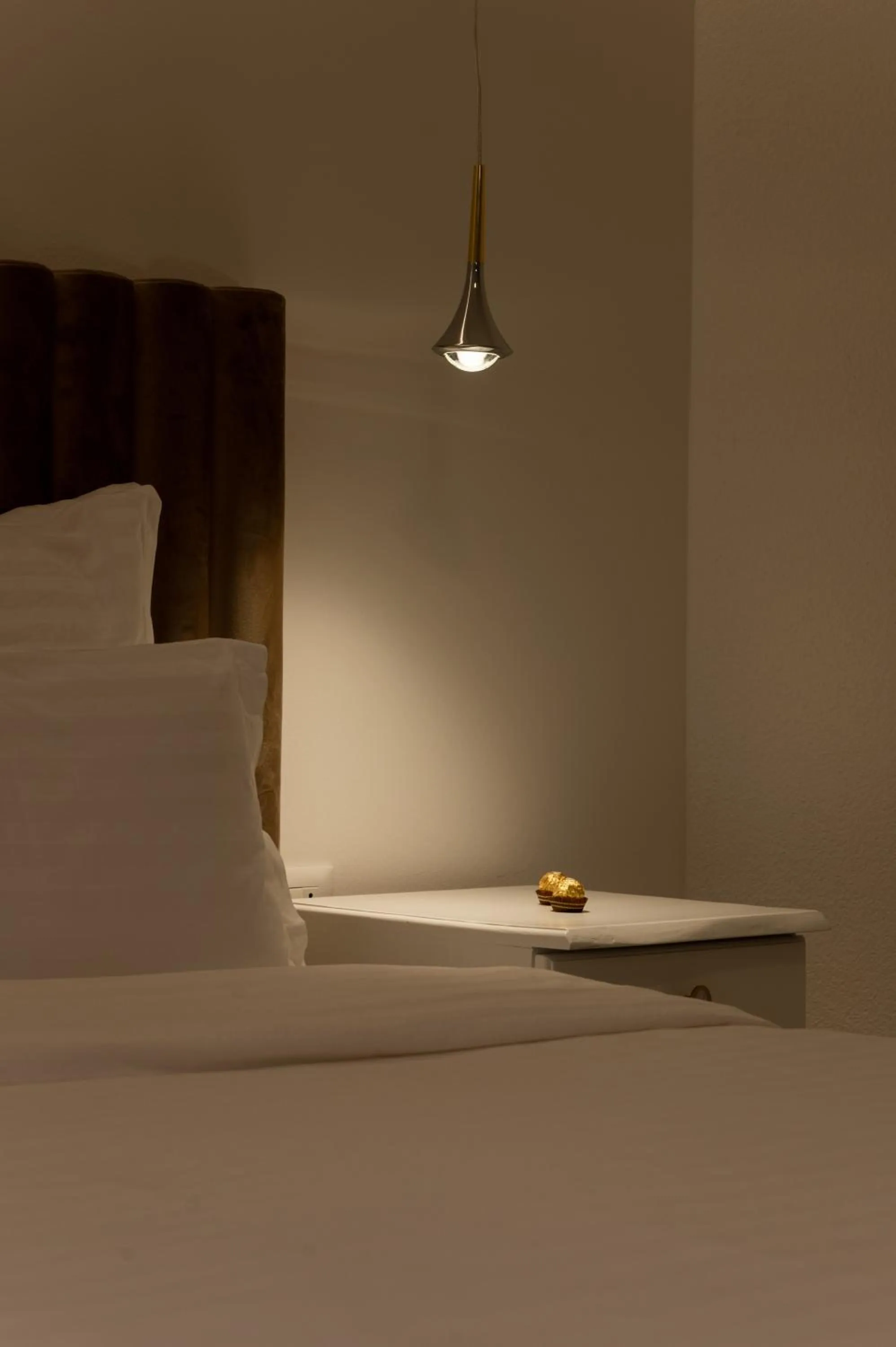 Bed in Nono Ban Boutique Hotel & Villas