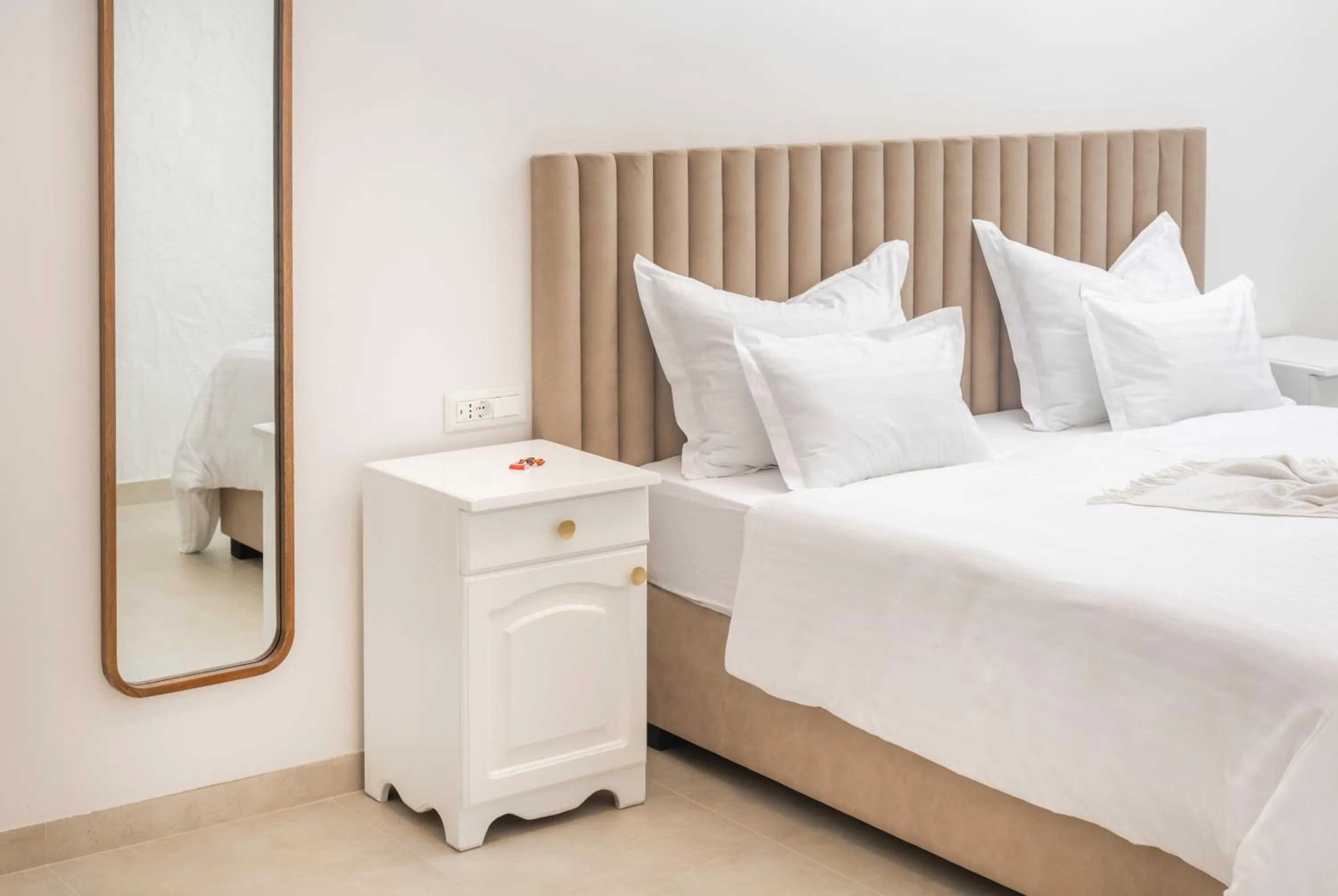 Bed in Nono Ban Boutique Hotel & Villas