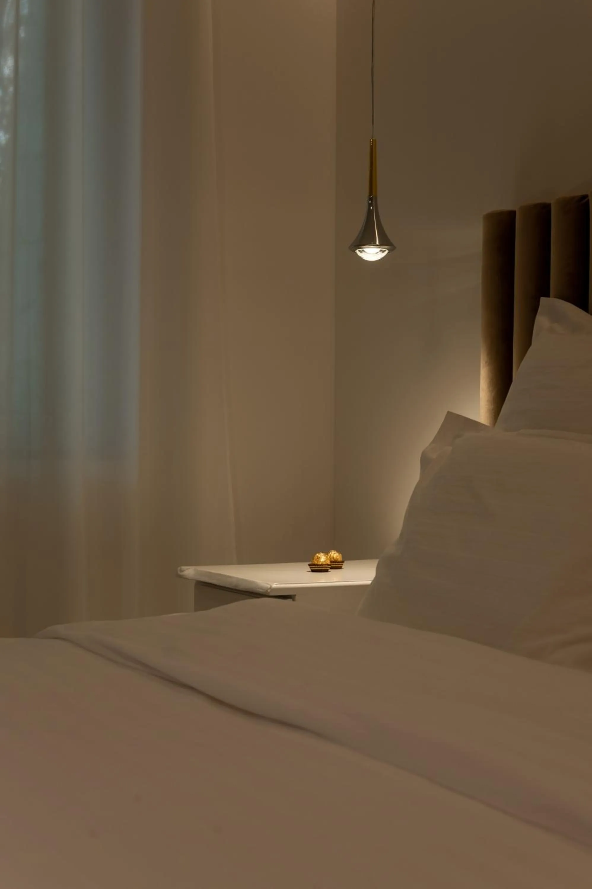 Bed in Nono Ban Boutique Hotel & Villas
