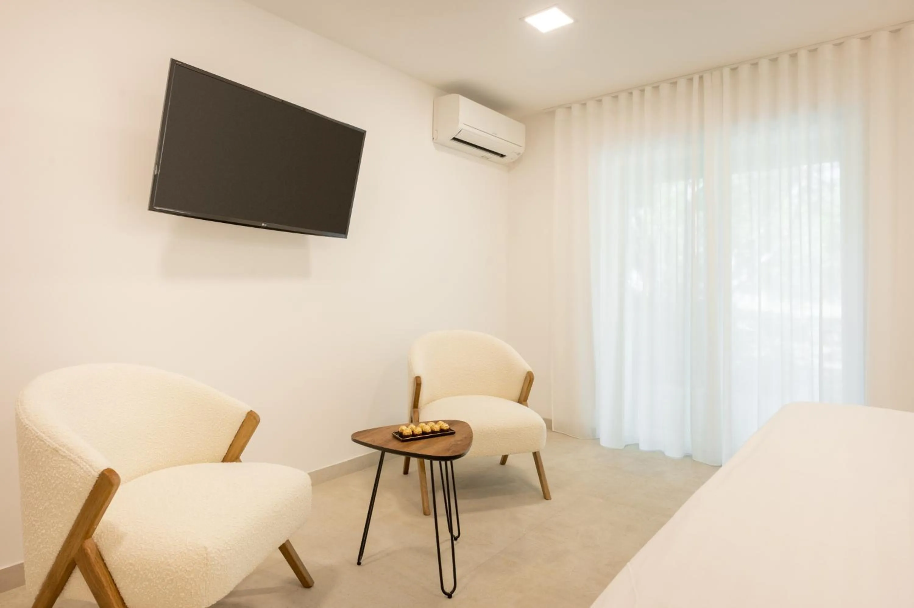 TV and multimedia, Bed in Nono Ban Boutique Hotel & Villas