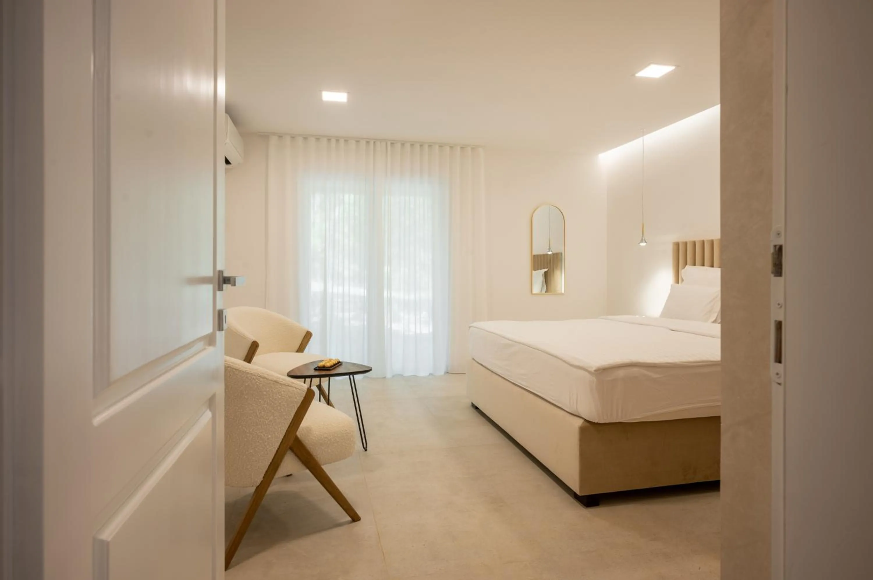 Bed in Nono Ban Boutique Hotel & Villas