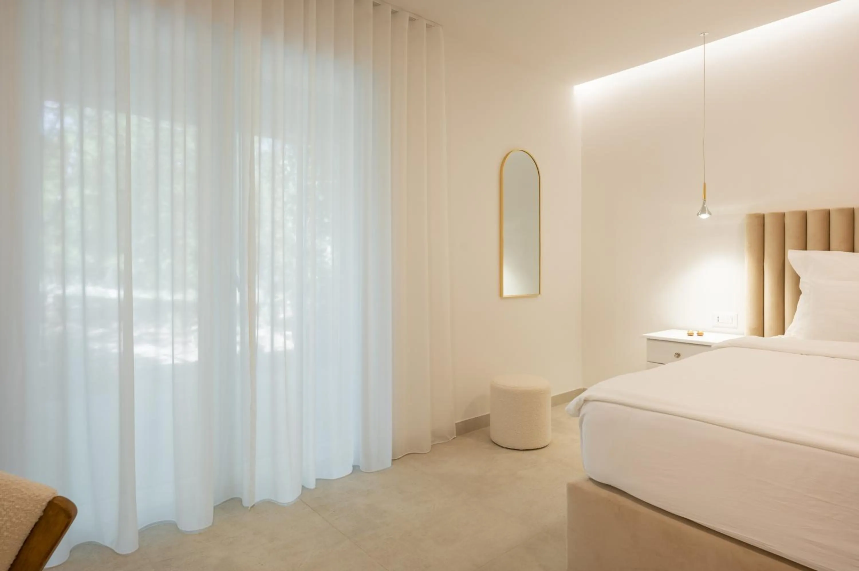 Bed in Nono Ban Boutique Hotel & Villas