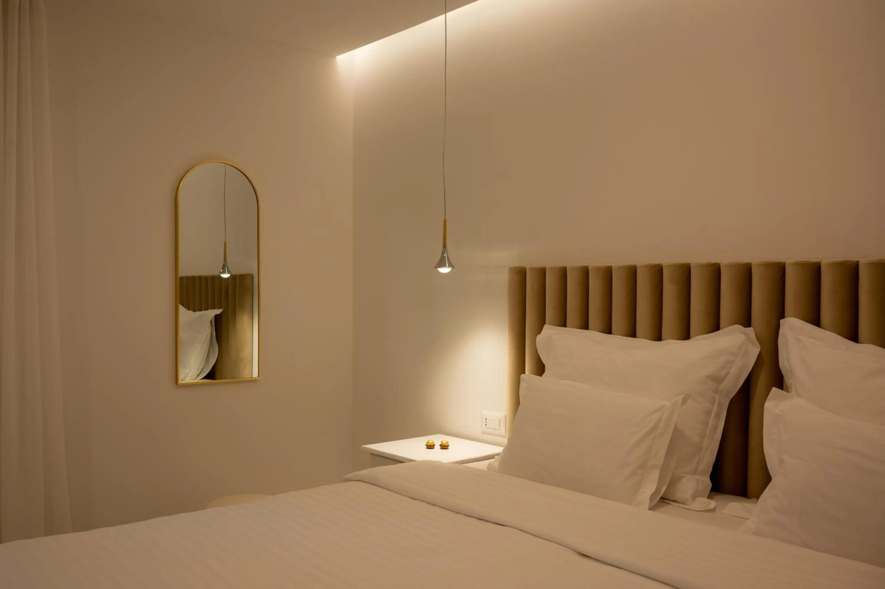 Bed in Nono Ban Boutique Hotel & Villas