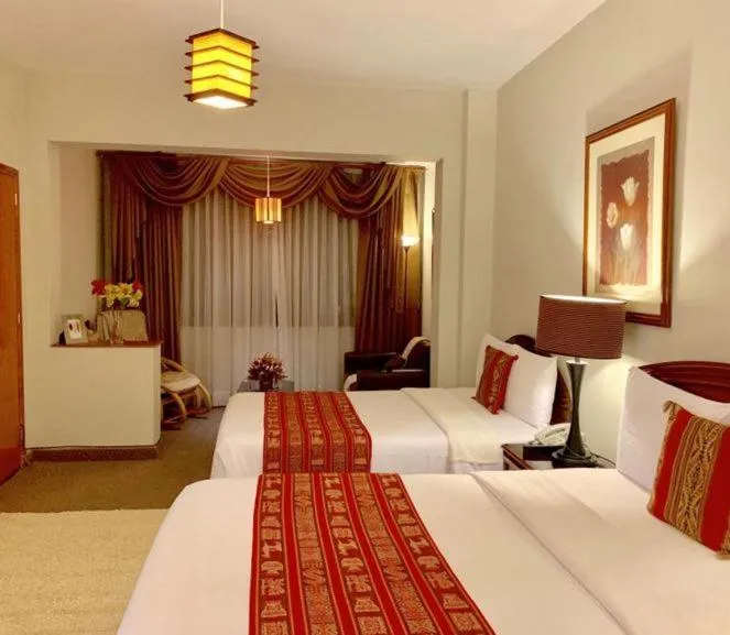 Bed in Casa Bella Boutique Hotel San Isidro