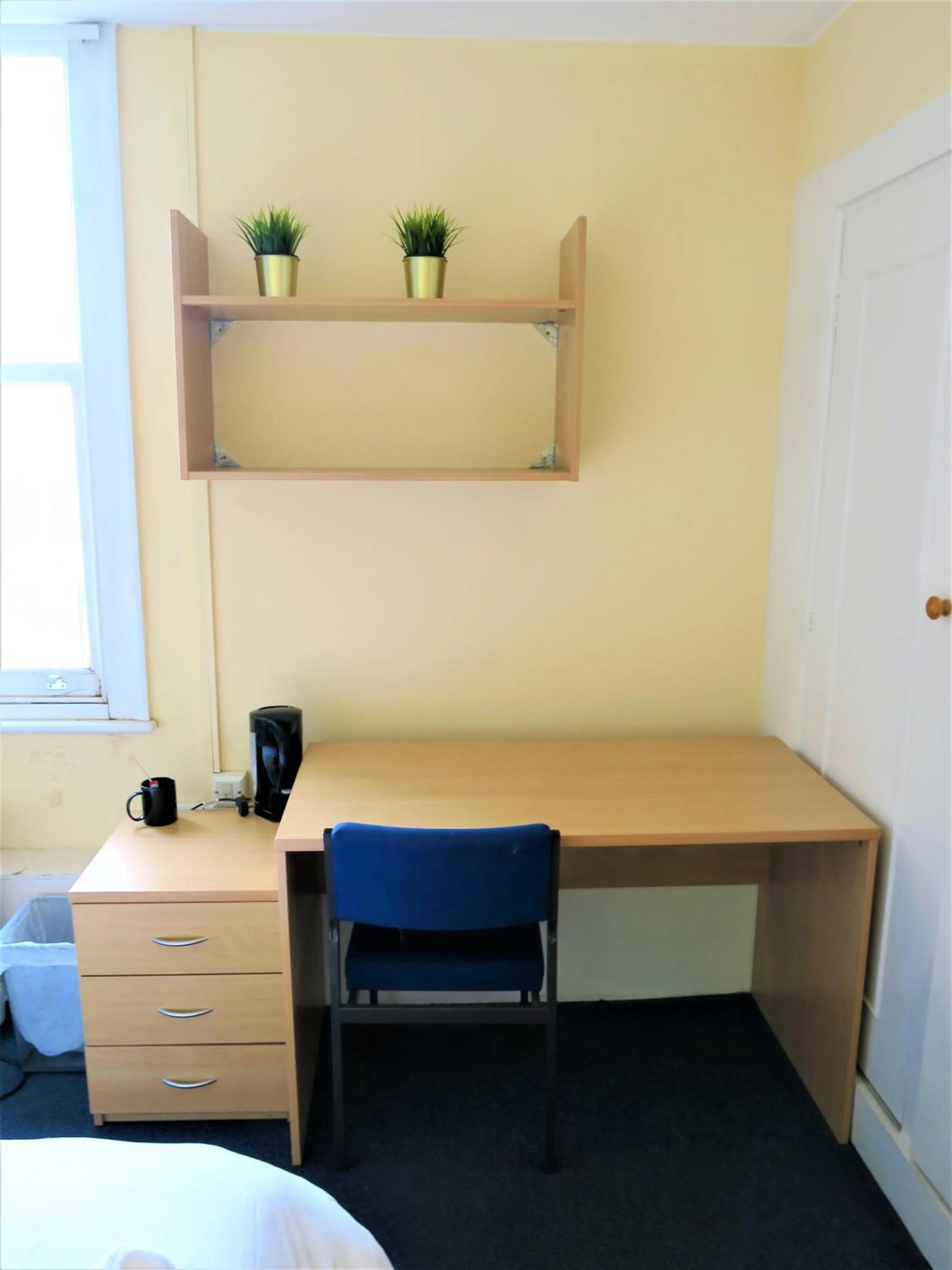 Decorative detail, TV/Entertainment Center in Hotel Strand Continental