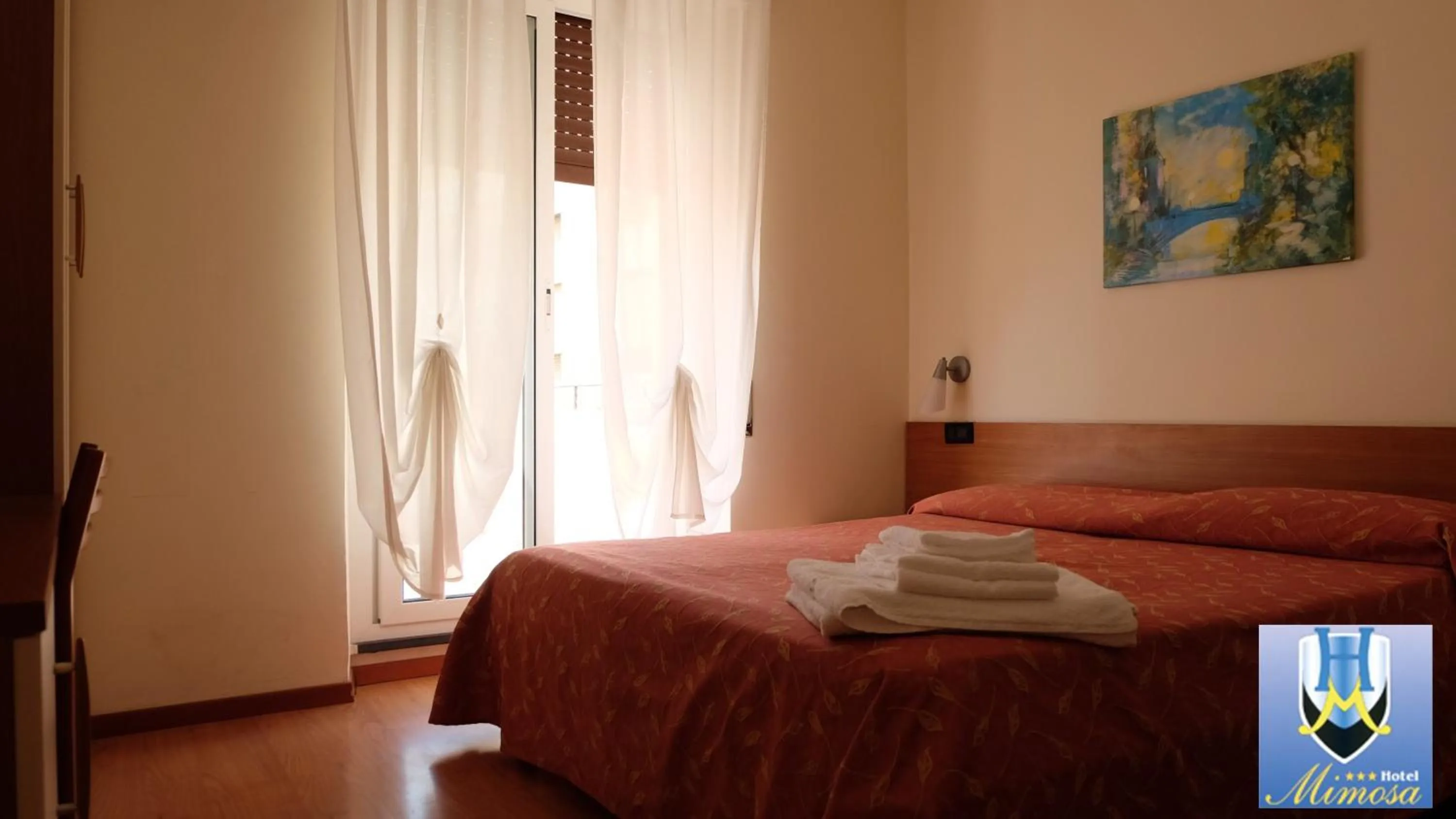 Photo of the whole room in Hotel Mimosa