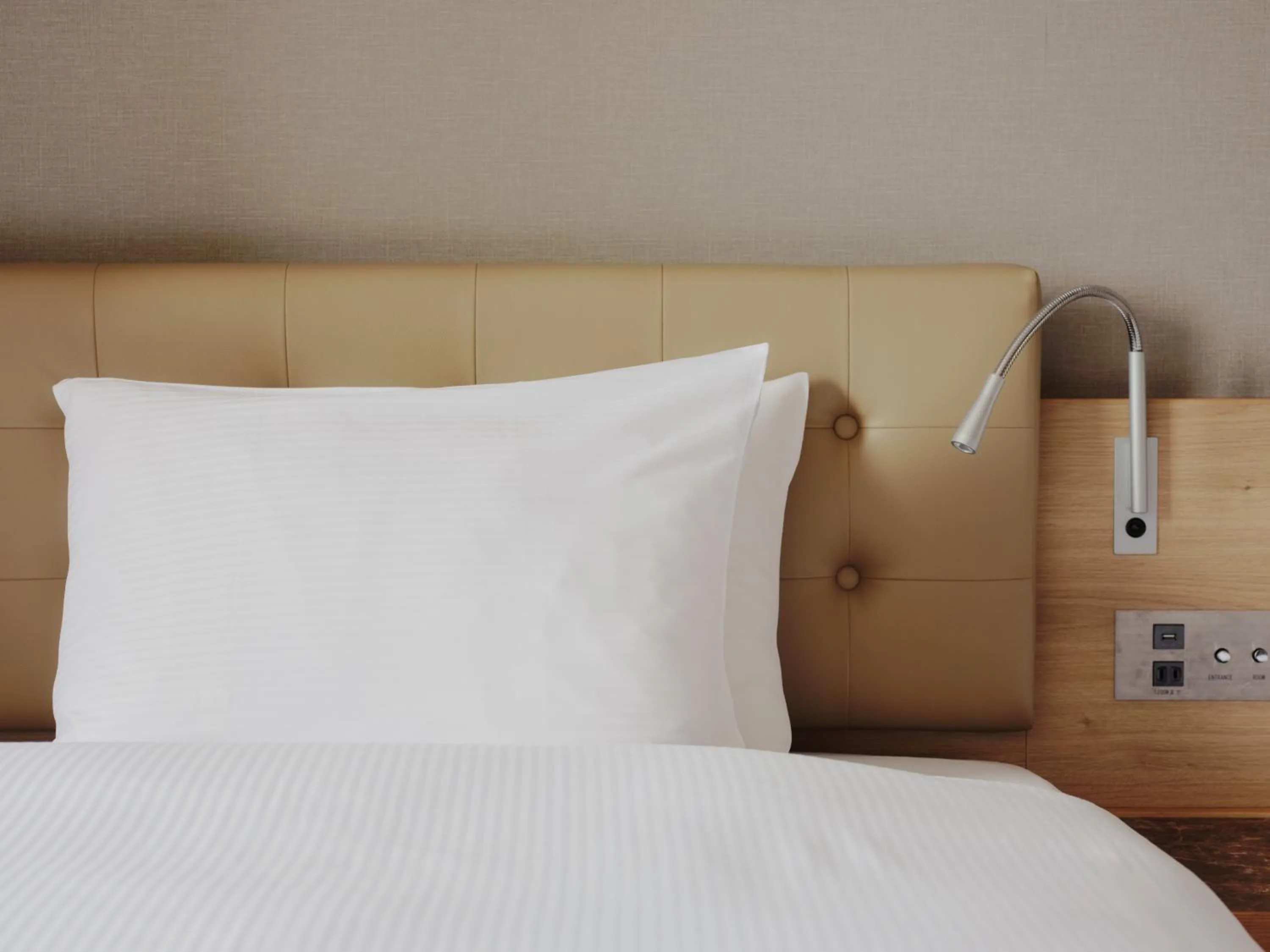 Bed in hotel MONday Haneda Airport