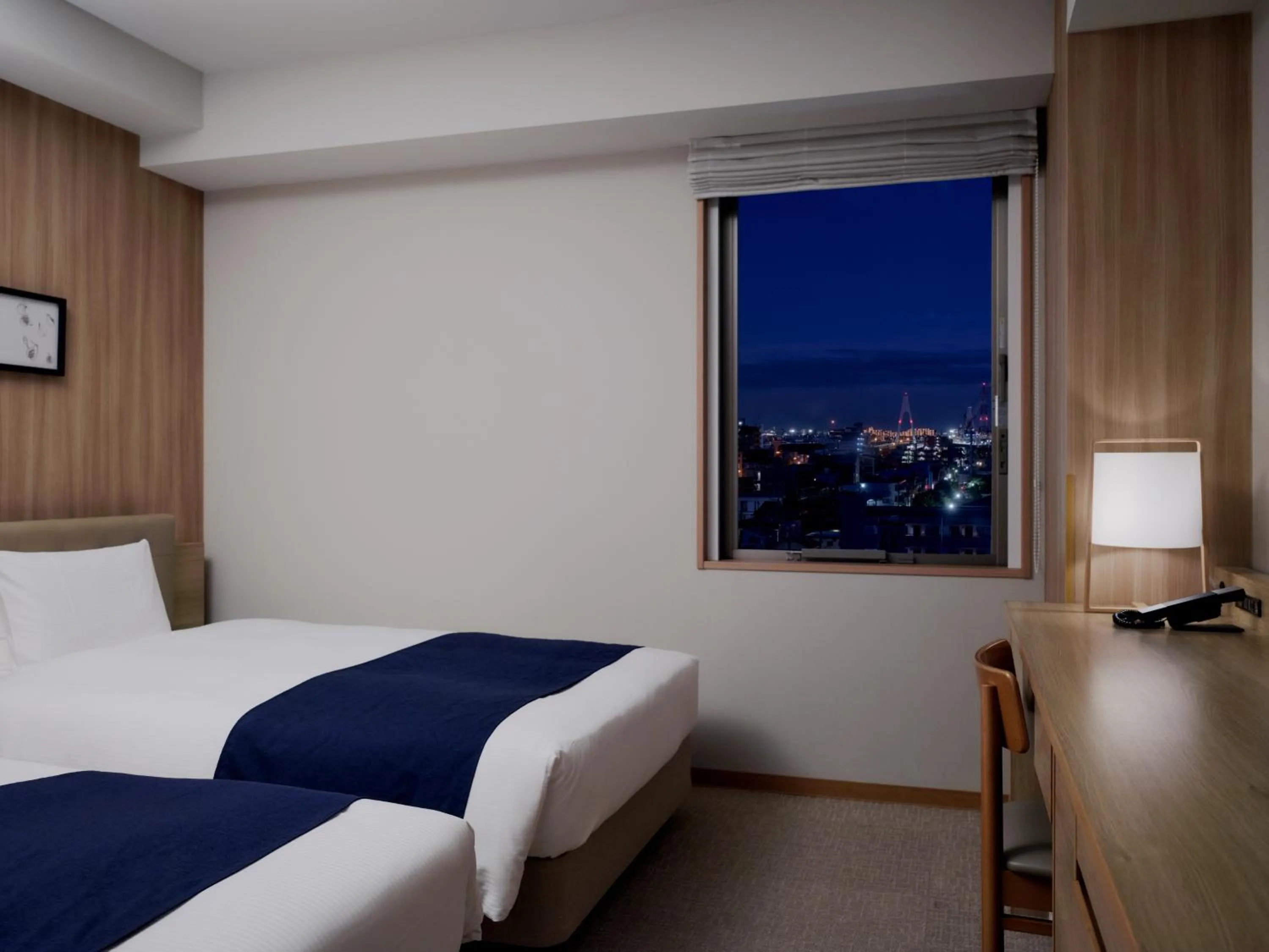 Bed in hotel MONday Haneda Airport