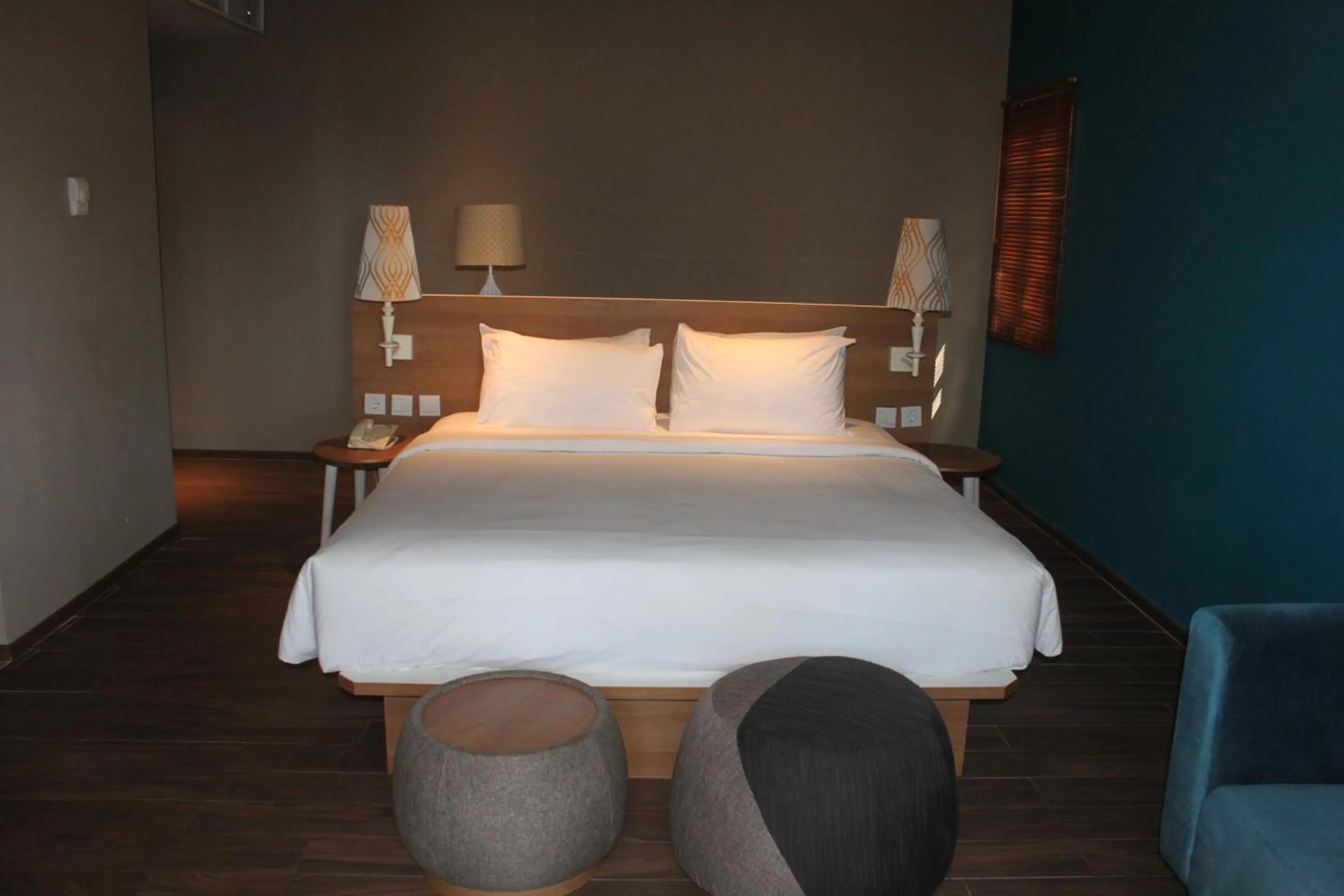 Bed in Manado Tateli Resort and Convention
