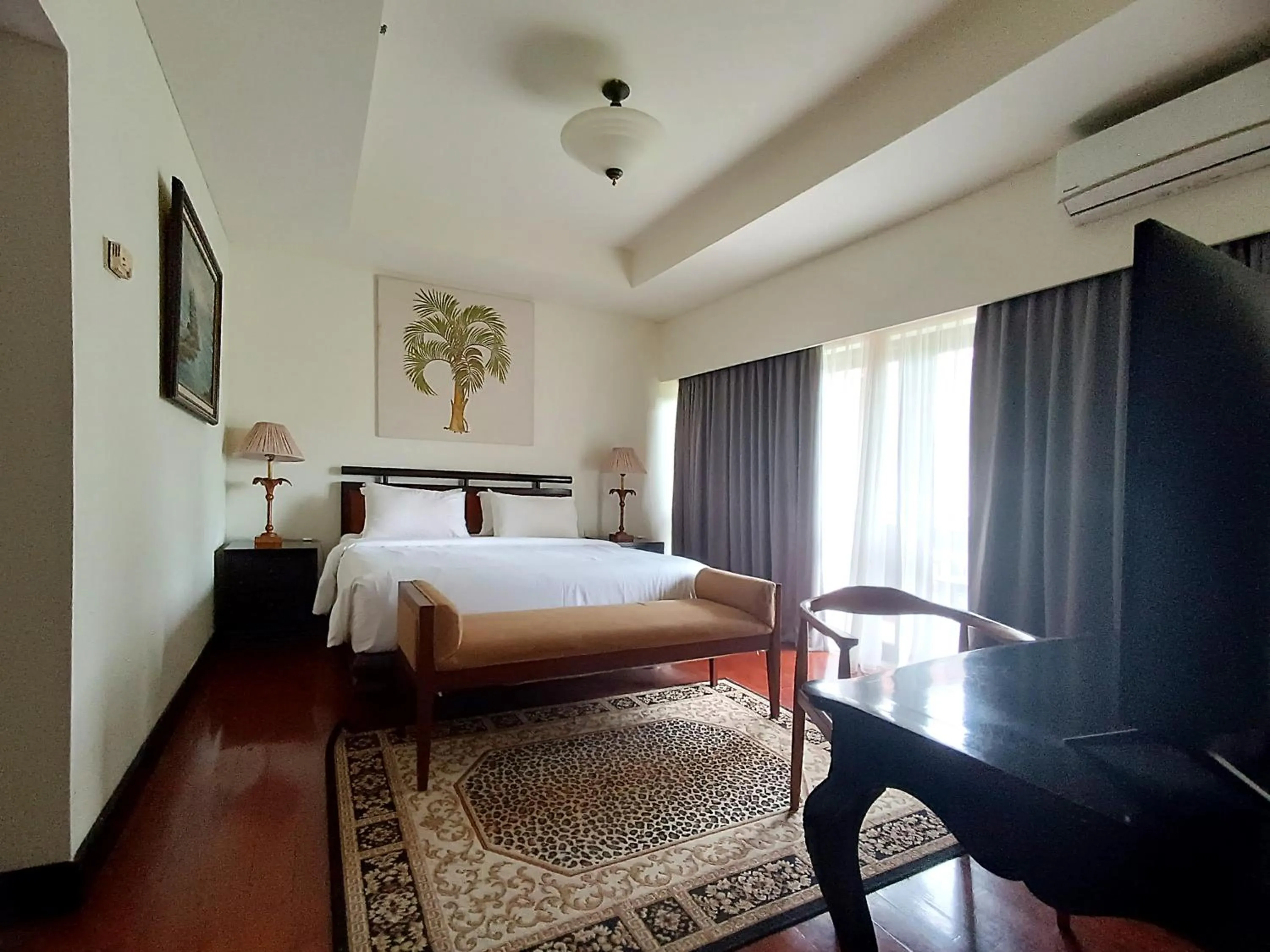 Bed in Manado Tateli Resort and Convention