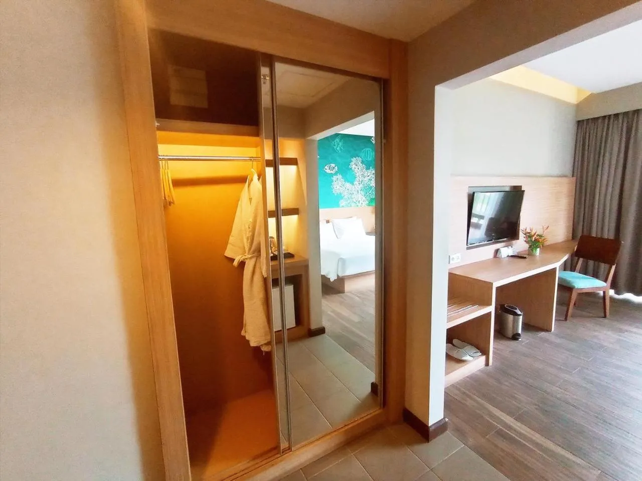 Living room, Bed in Manado Tateli Resort and Convention