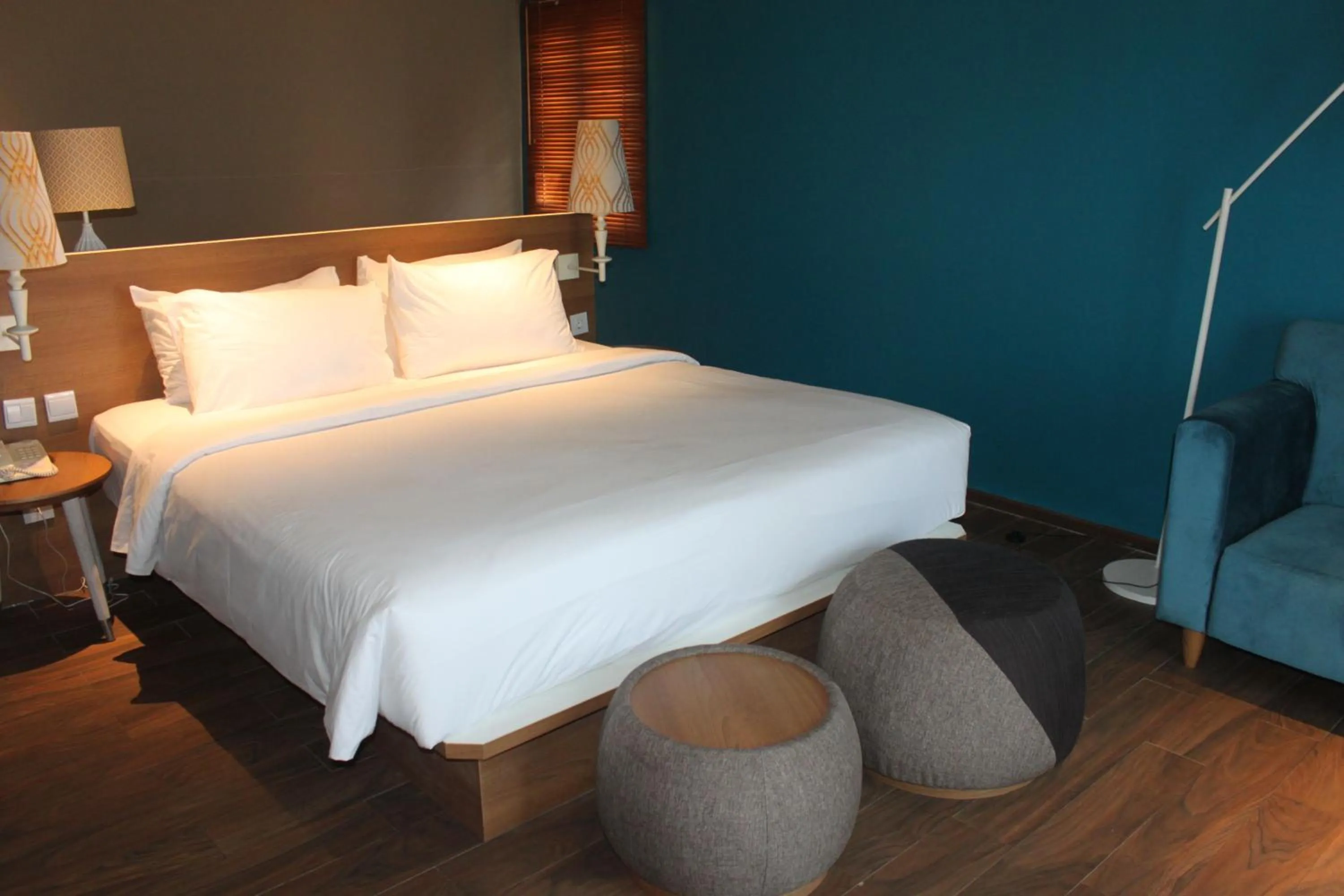 Bed in Manado Tateli Resort and Convention