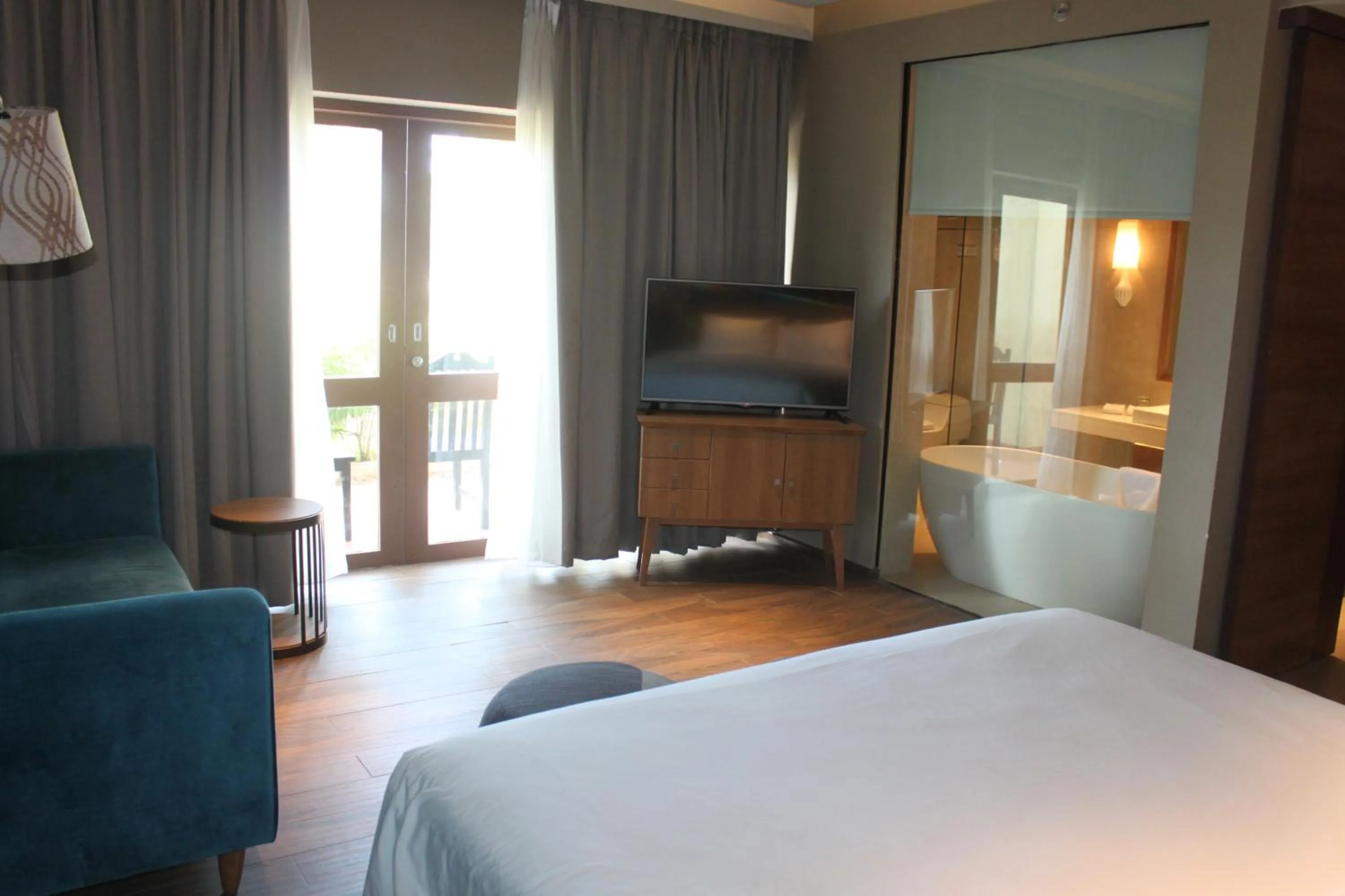 Bed in Manado Tateli Resort and Convention