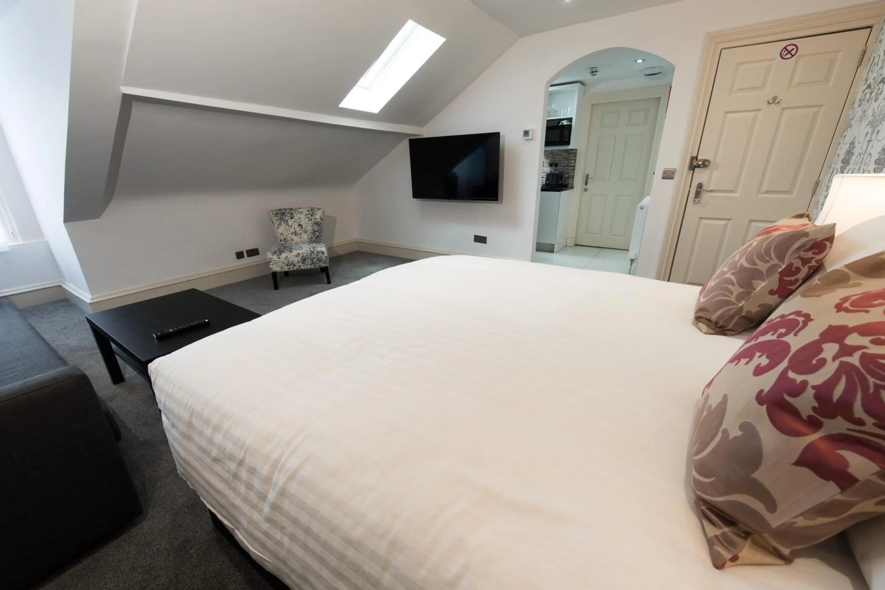 Bed in Royal Princes Suites