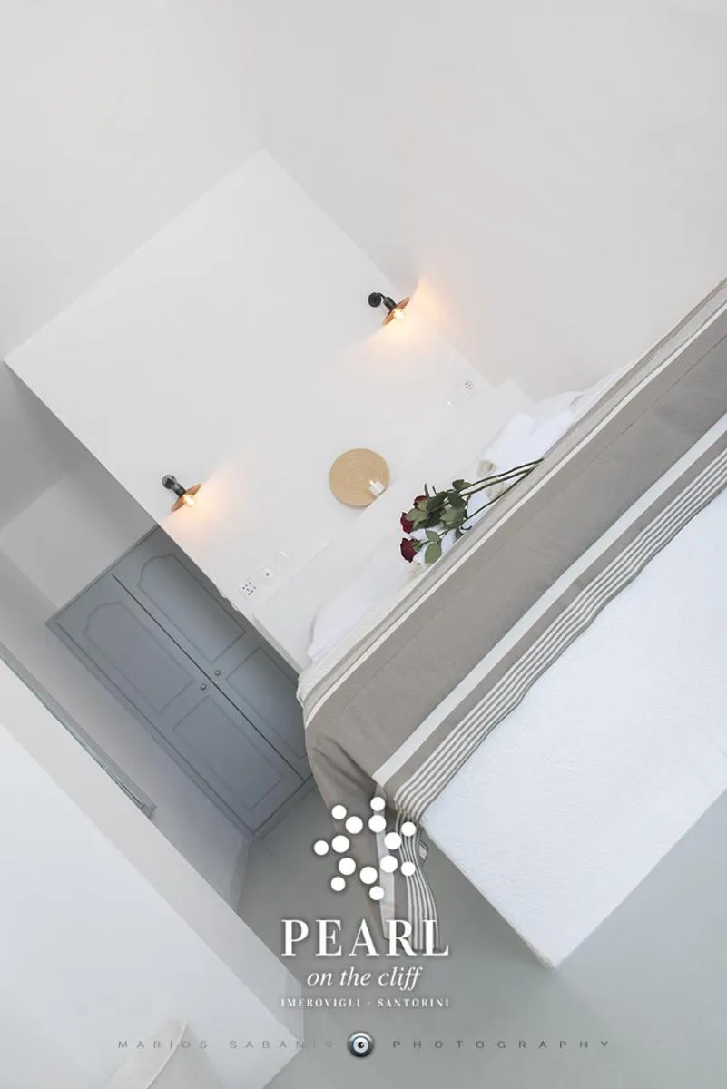 Bed in Pearl on the Cliff Hotel & Suites by Pearl Hotel Collection