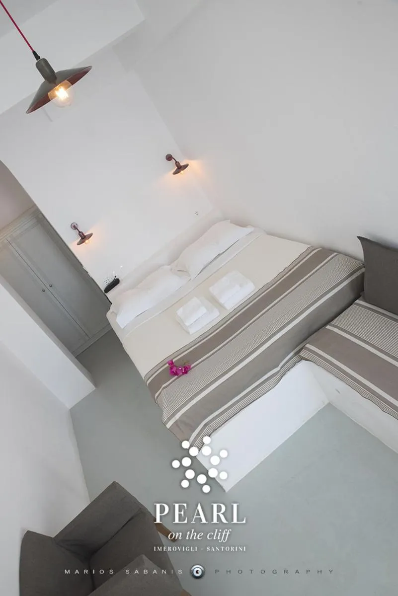 Bed in Pearl on the Cliff Hotel & Suites by Pearl Hotel Collection