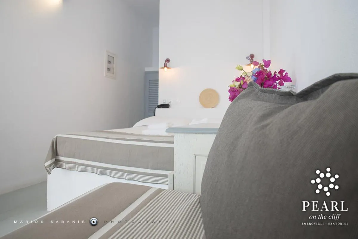 Bed in Pearl on the Cliff Hotel & Suites by Pearl Hotel Collection